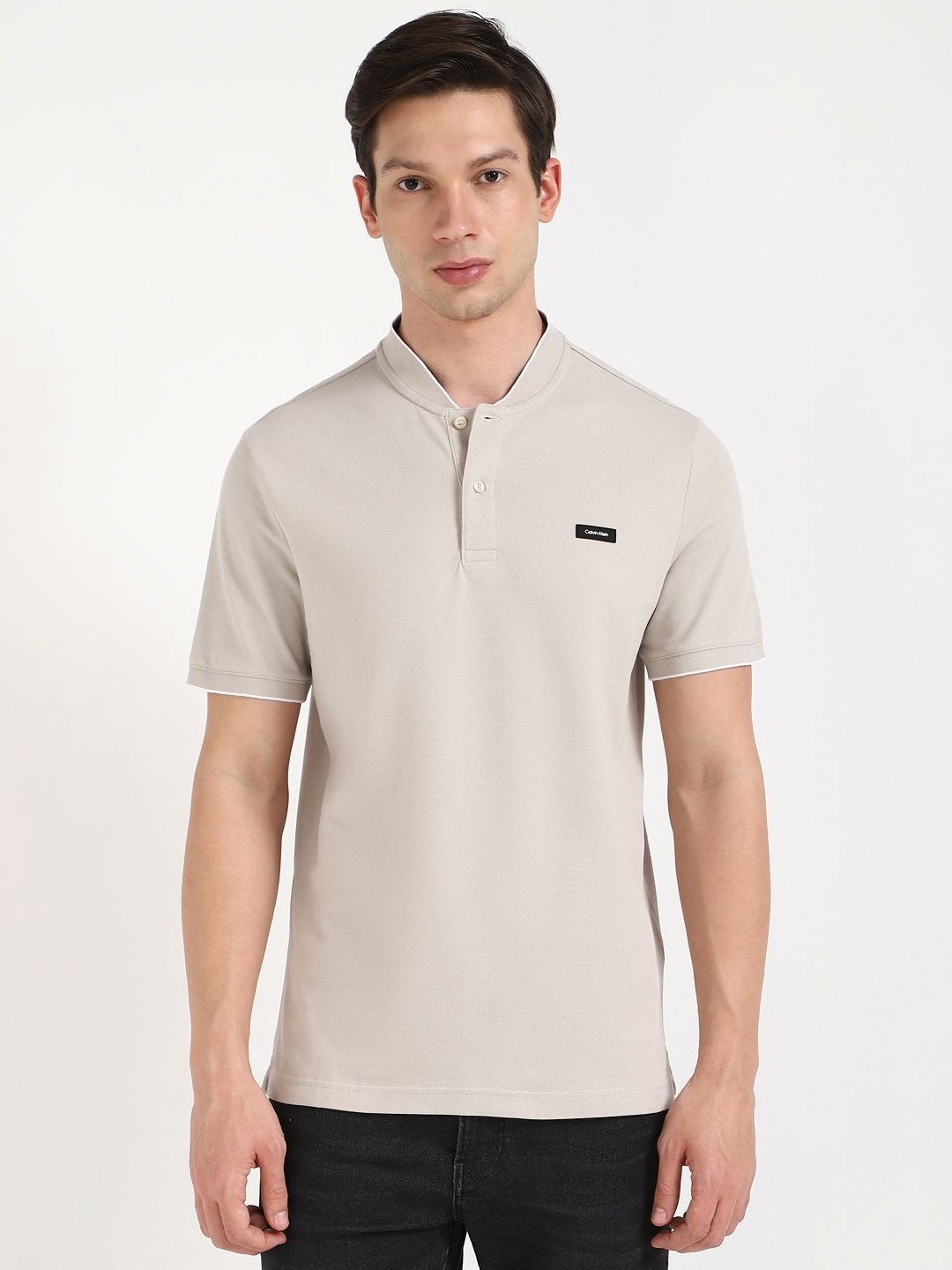 

Calvin Klein Jeans Men Solid Mandarin Collar Cotton T-shirt, Grey