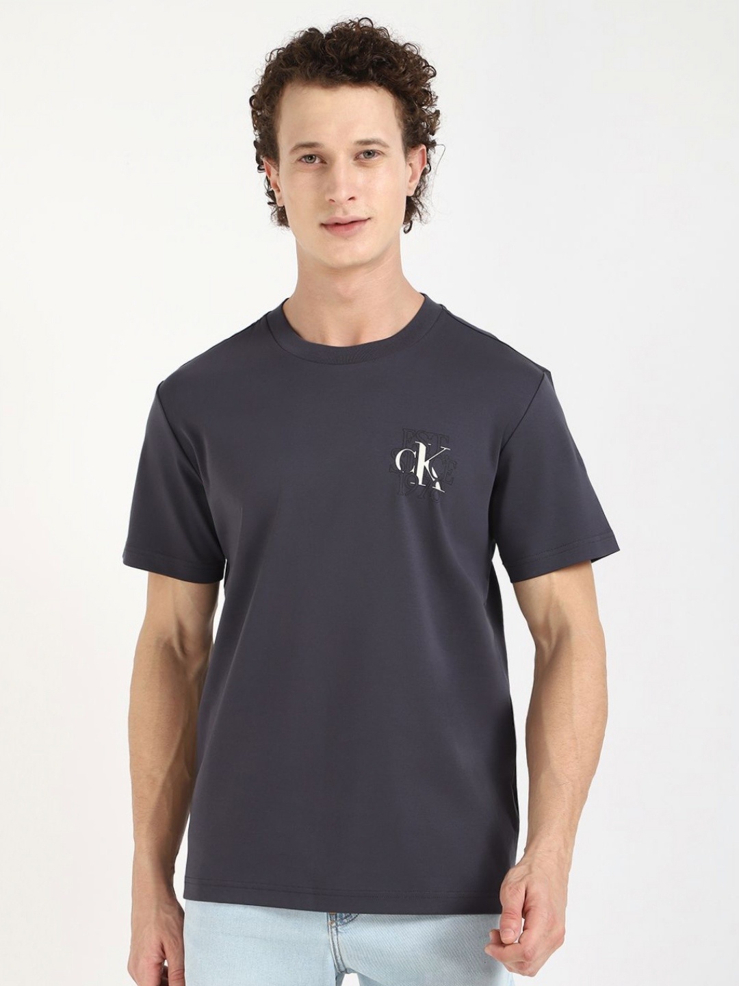 

Calvin Klein Jeans Men Typography Printed Round Neck Cotton T-shirt, Navy blue