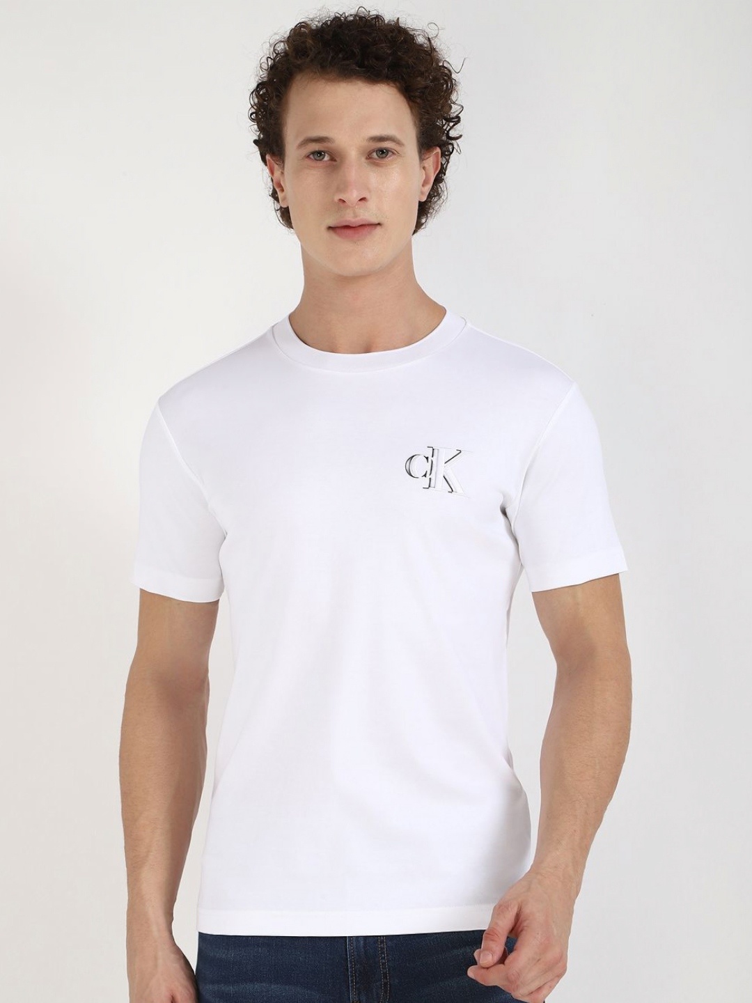 

Calvin Klein Jeans Men Typography Printed Round Neck Cotton T-shirt, White