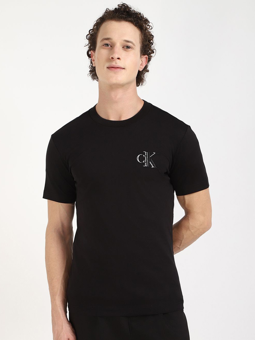 

Calvin Klein Jeans Men Typography Printed Round Neck Cotton T-shirt, Black