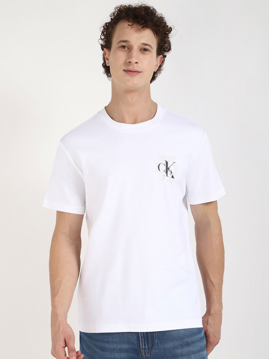 

Calvin Klein Jeans Men Typography Printed Round Neck Cotton T-shirt, White