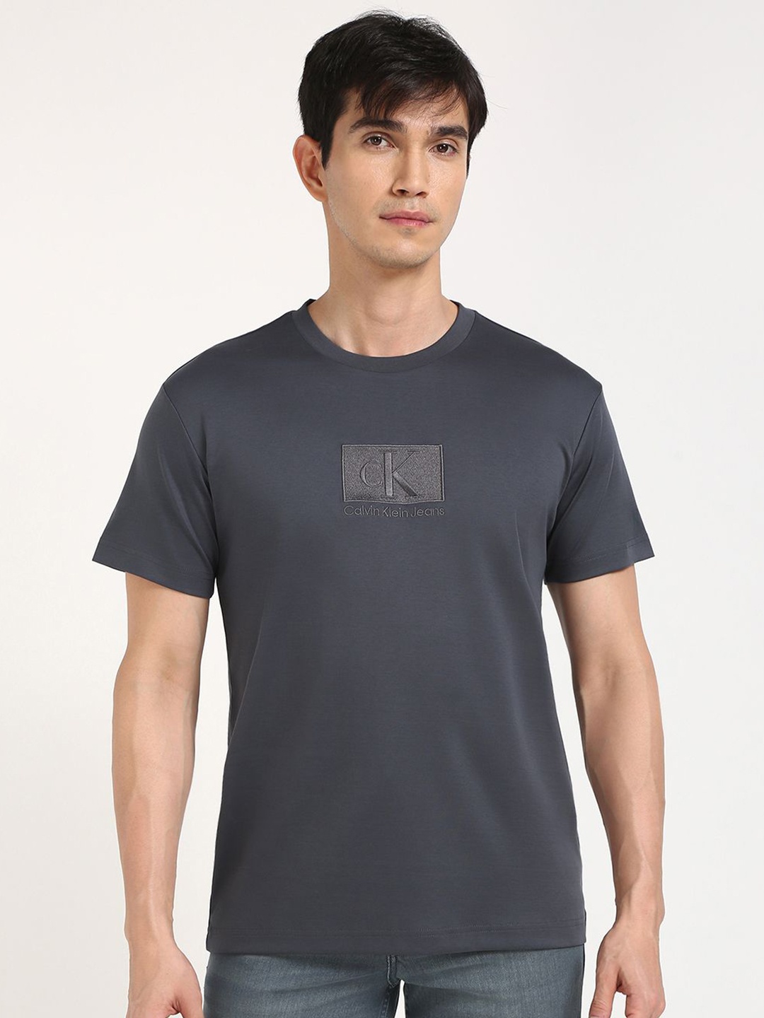 

Calvin Klein Jeans Men Typography Printed Round Neck Cotton T-shirt, Navy blue