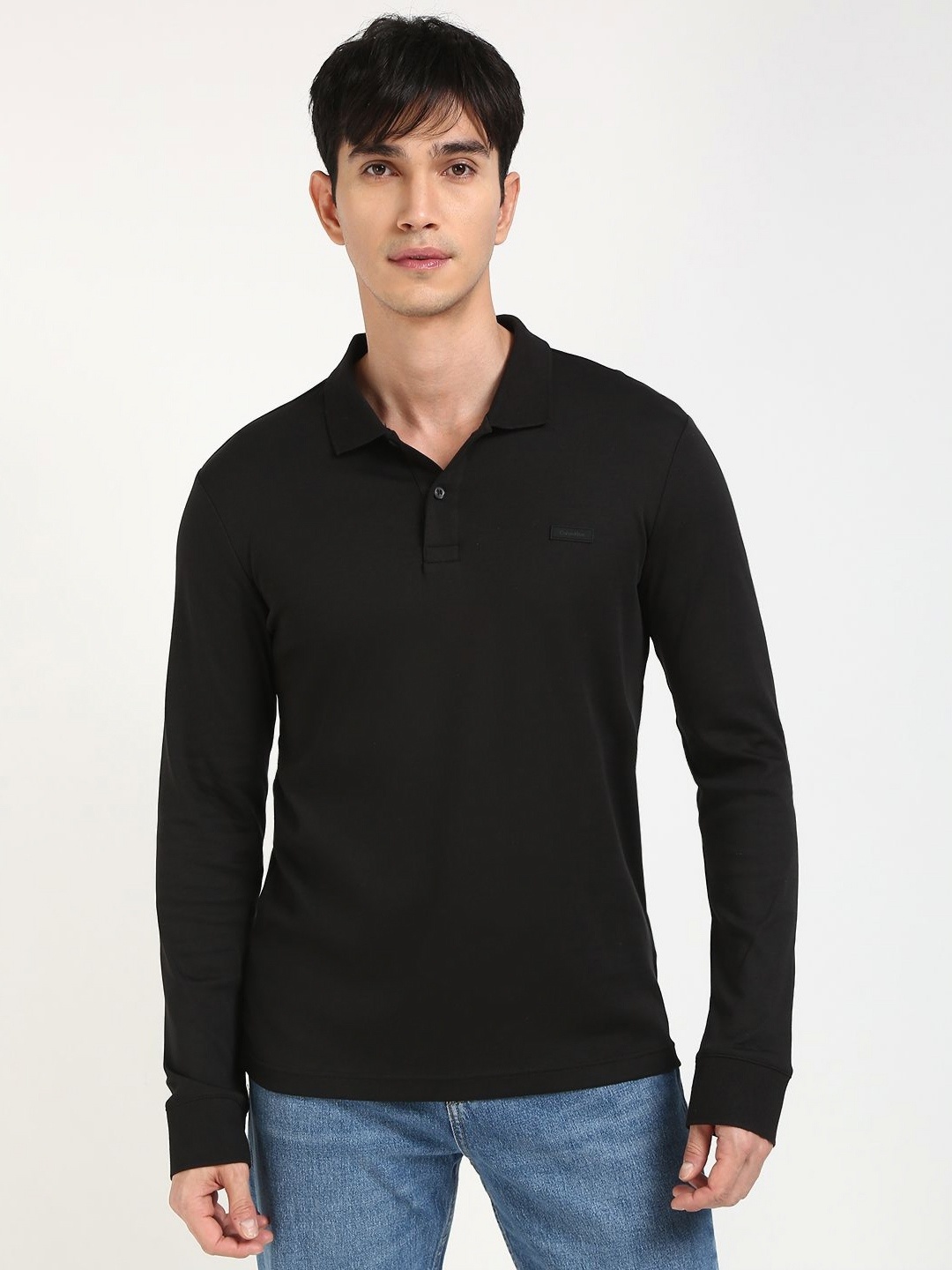 

Calvin Klein Jeans Men Solid Polo Collar Cotton T-shirt, Black