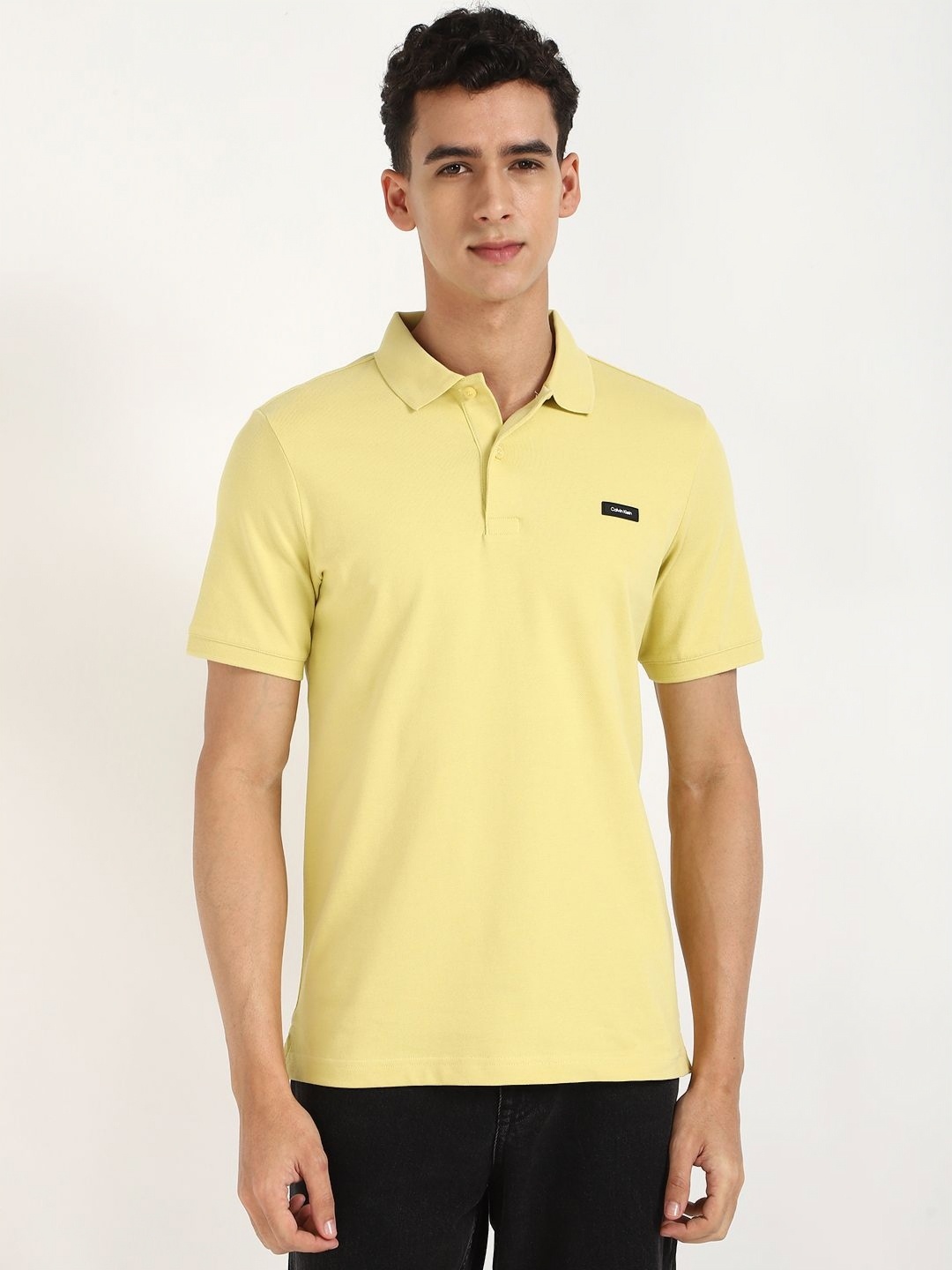 

Calvin Klein Jeans Men Solid Polo Collar Cotton T-shirt, Yellow