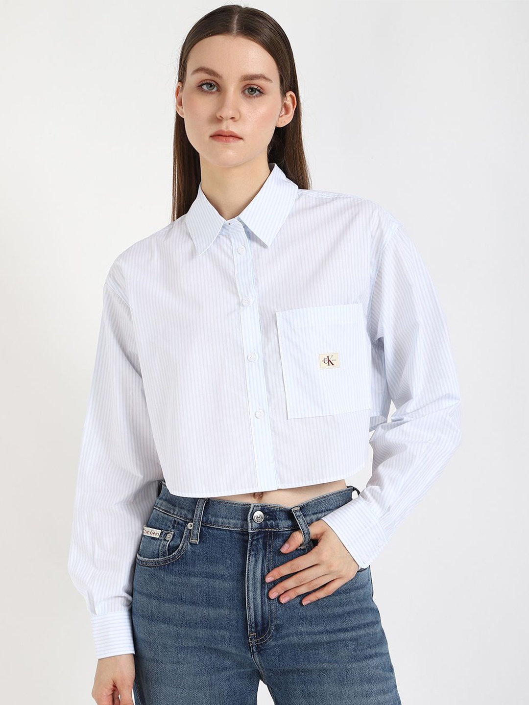 

Calvin Klein Jeans Women Spread Collar Vertical Striped Cotton Casual Shirt, Blue