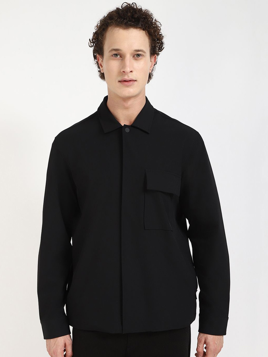 

Calvin Klein Jeans Men Spread Collar Solid Casual Shirt, Black
