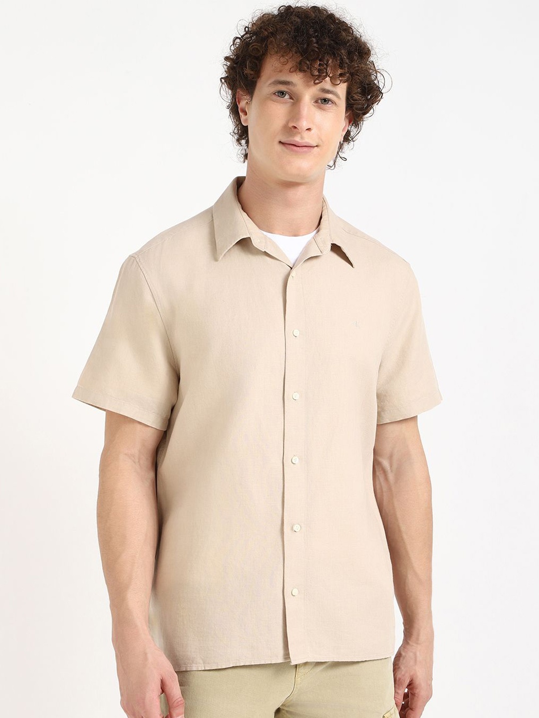 

Calvin Klein Jeans Men Spread Collar Solid Cotton Casual Shirt, Beige