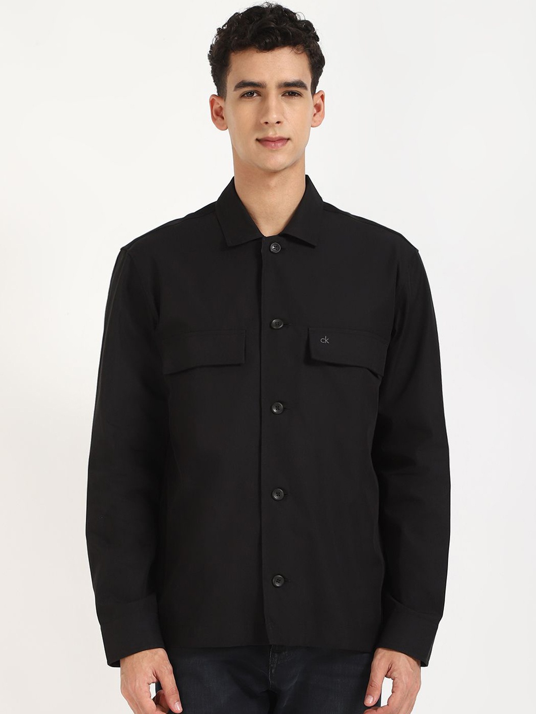 

Calvin Klein Jeans Men Spread Collar Solid Cotton Casual Shirt, Black