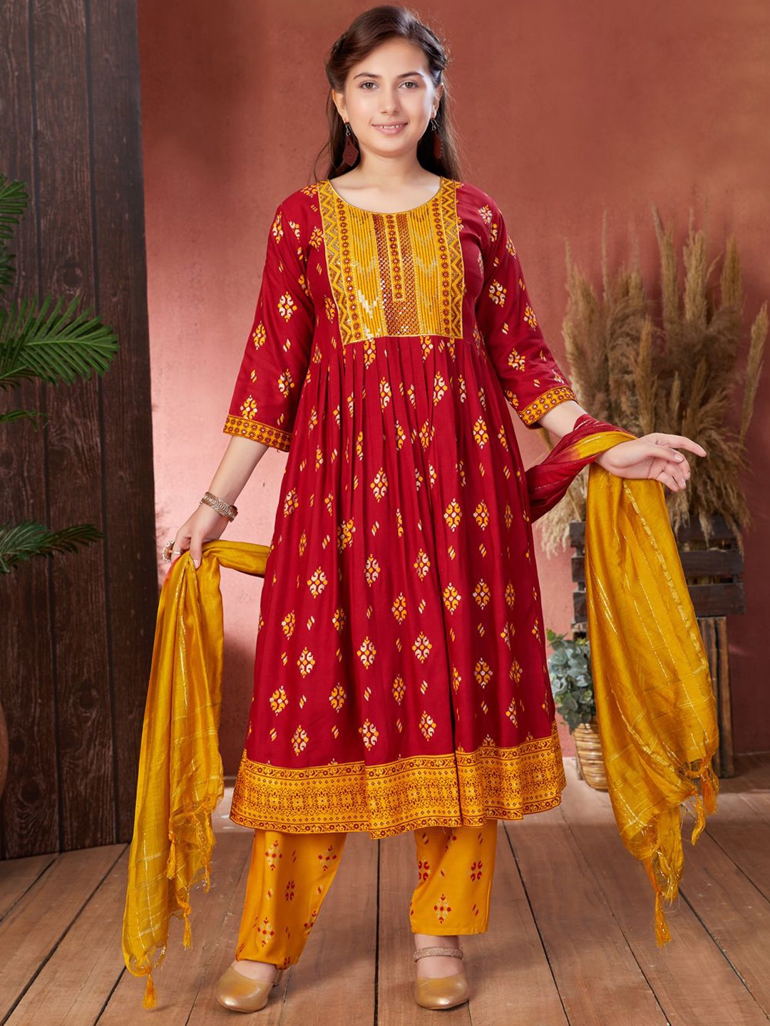 

Sangria Girls Rust Ethnic Motifs Printed Sequins Pure Cotton Anarkali Kurta