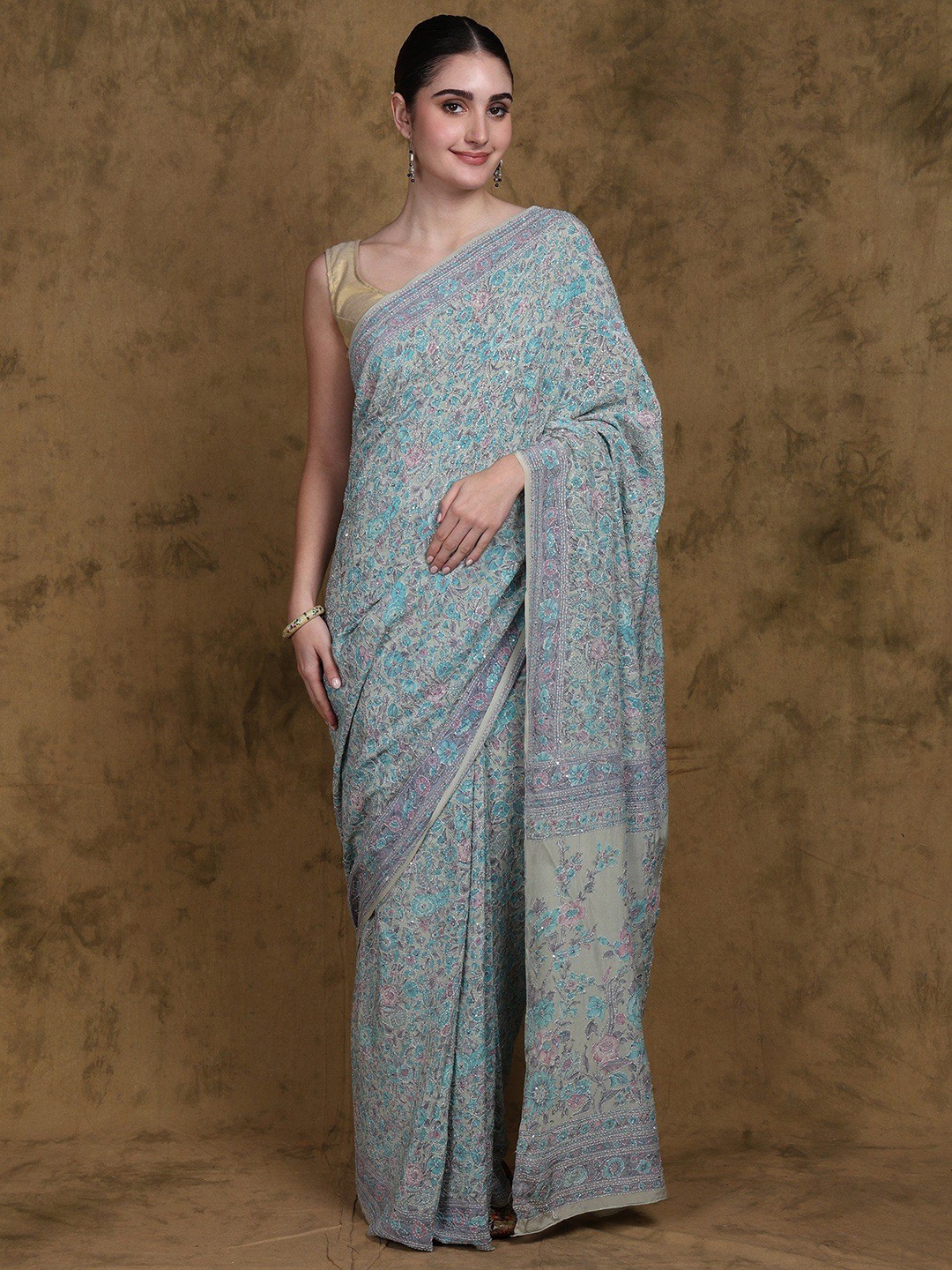 

Exotic India Green Tint Floral Print Crepe Saree with All over Kantha Embroidery