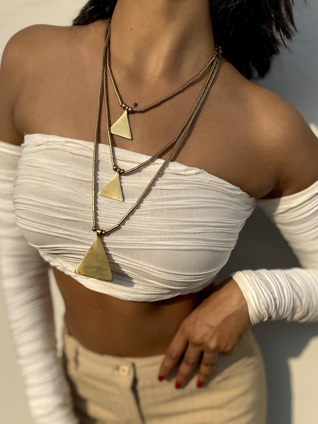 

Janpath Online Gold-Plated Triangular Shaped Layered Necklace