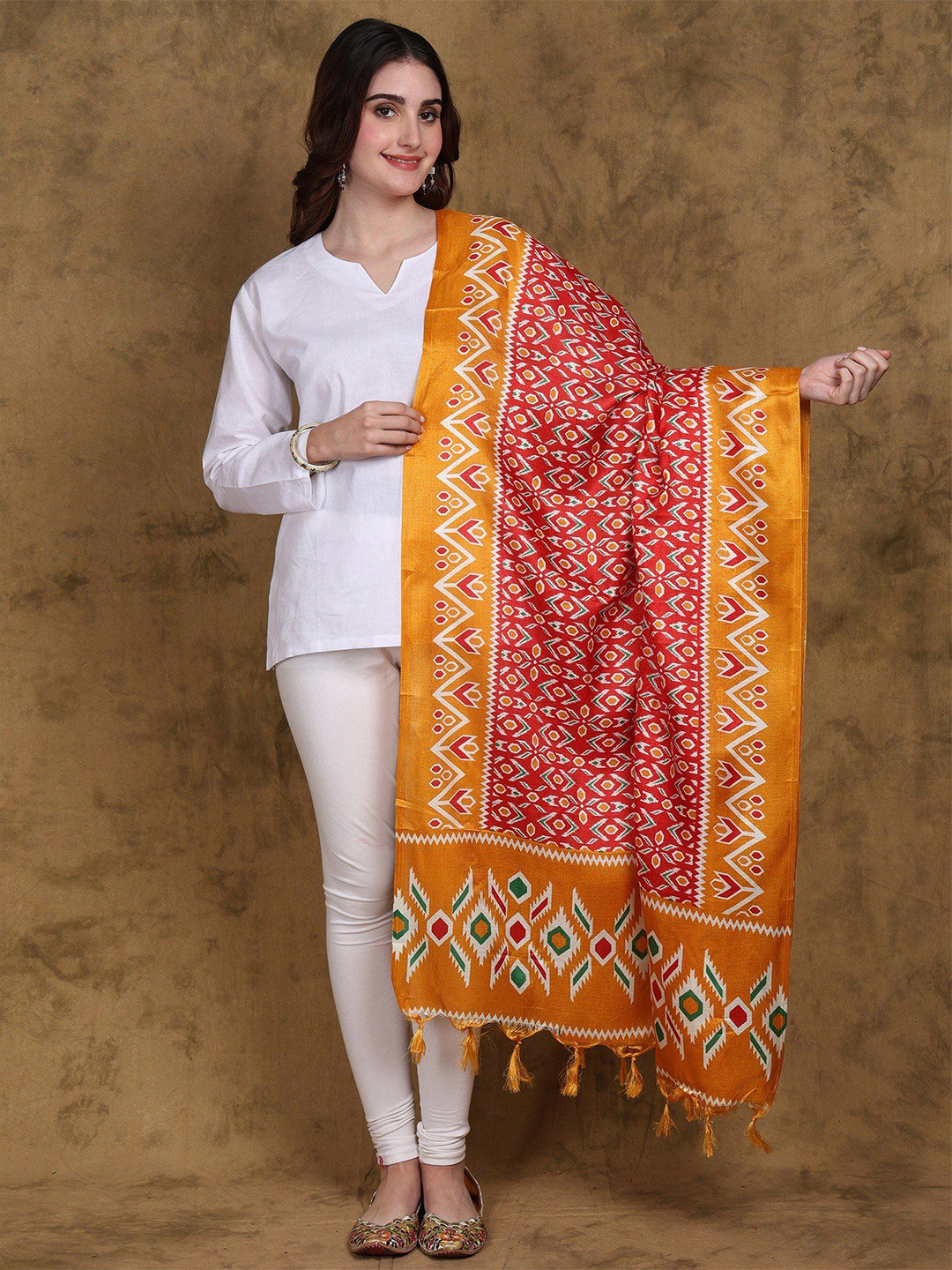 

Exotic India True Red Ikat Print Art Silk Dupatta with Fringes