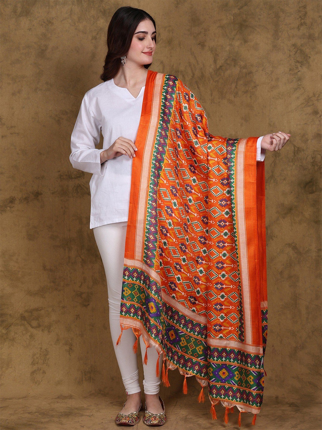 

Exotic India Mandarin Orange Patola Printed Art Silk Dupatta with Fringes