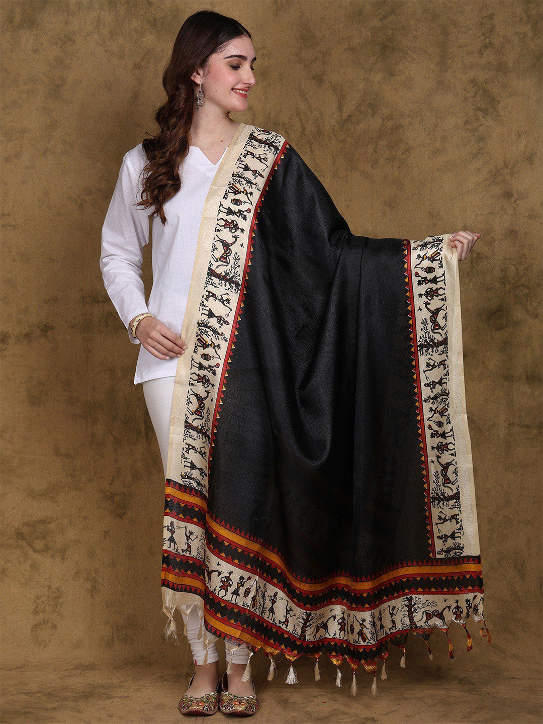 

Exotic India Women Art Silk Black Dupatta with Warli Art Print Border