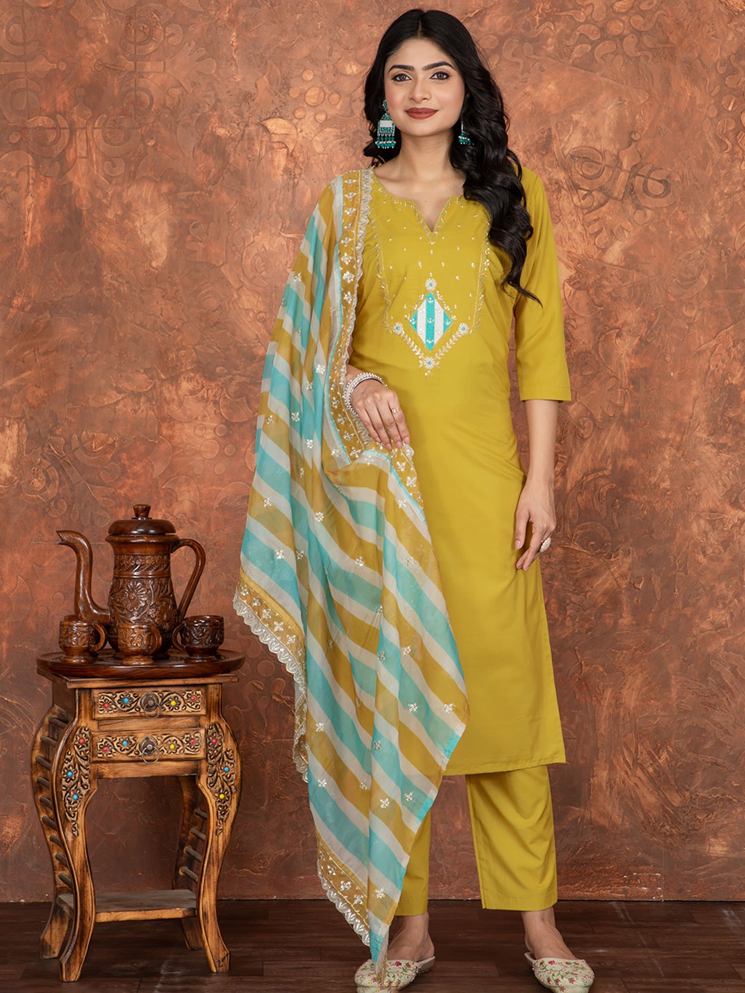 

Shriji fashion Sequinned Notch Neck Straight Kurta With Trouser & Dupatta, Mustard