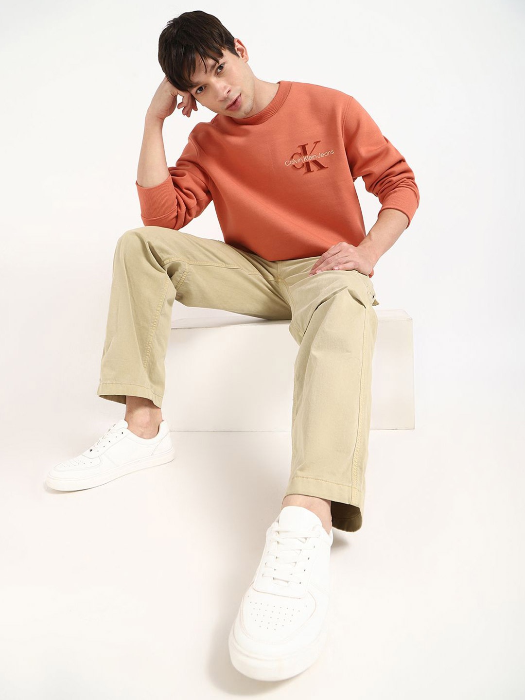 

Calvin Klein Jeans Men Printed Round Neck Sweatshirt, Orange
