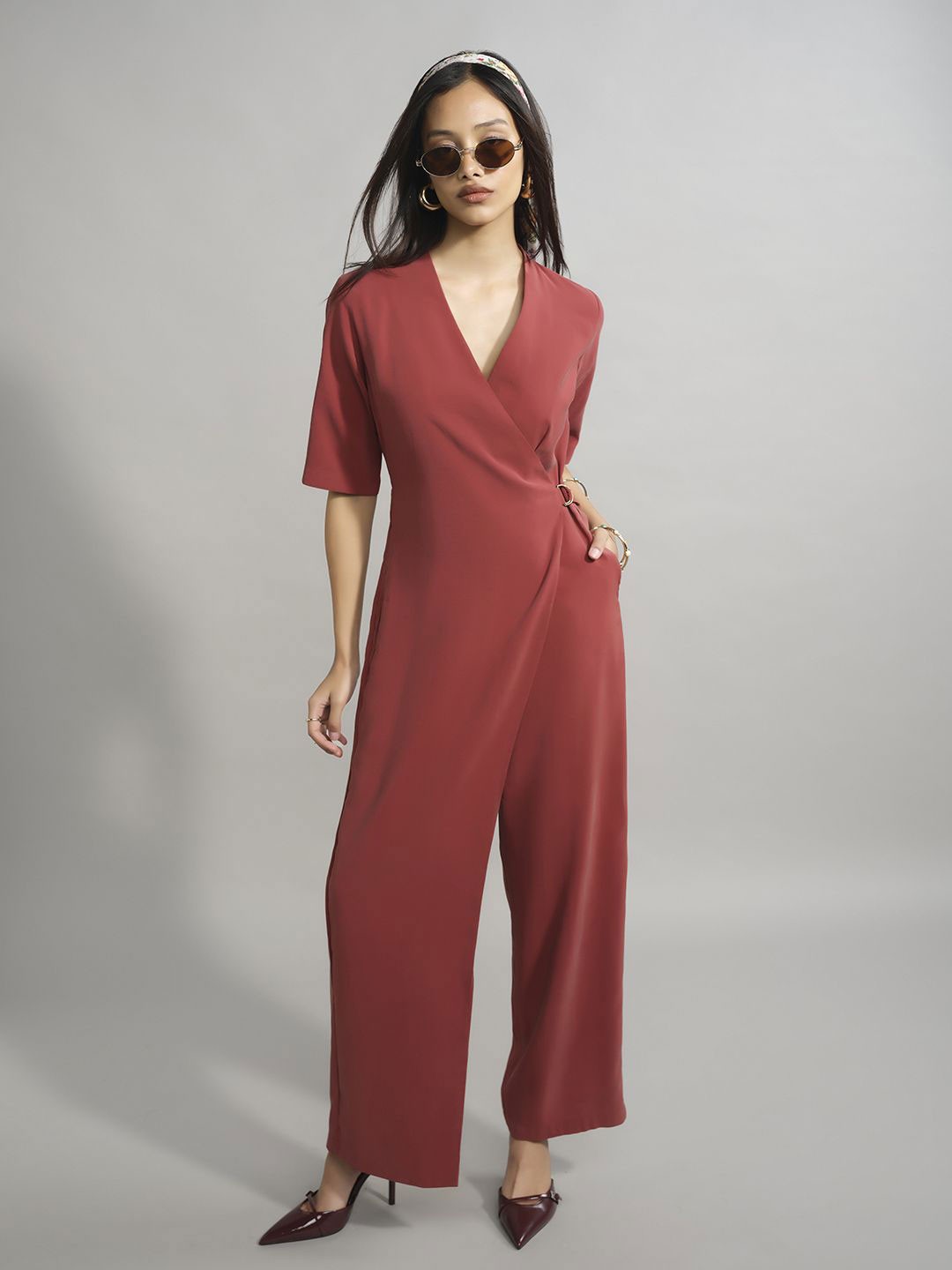 

AND Women Solid V-Neck Basic Jumpsuit, Rust