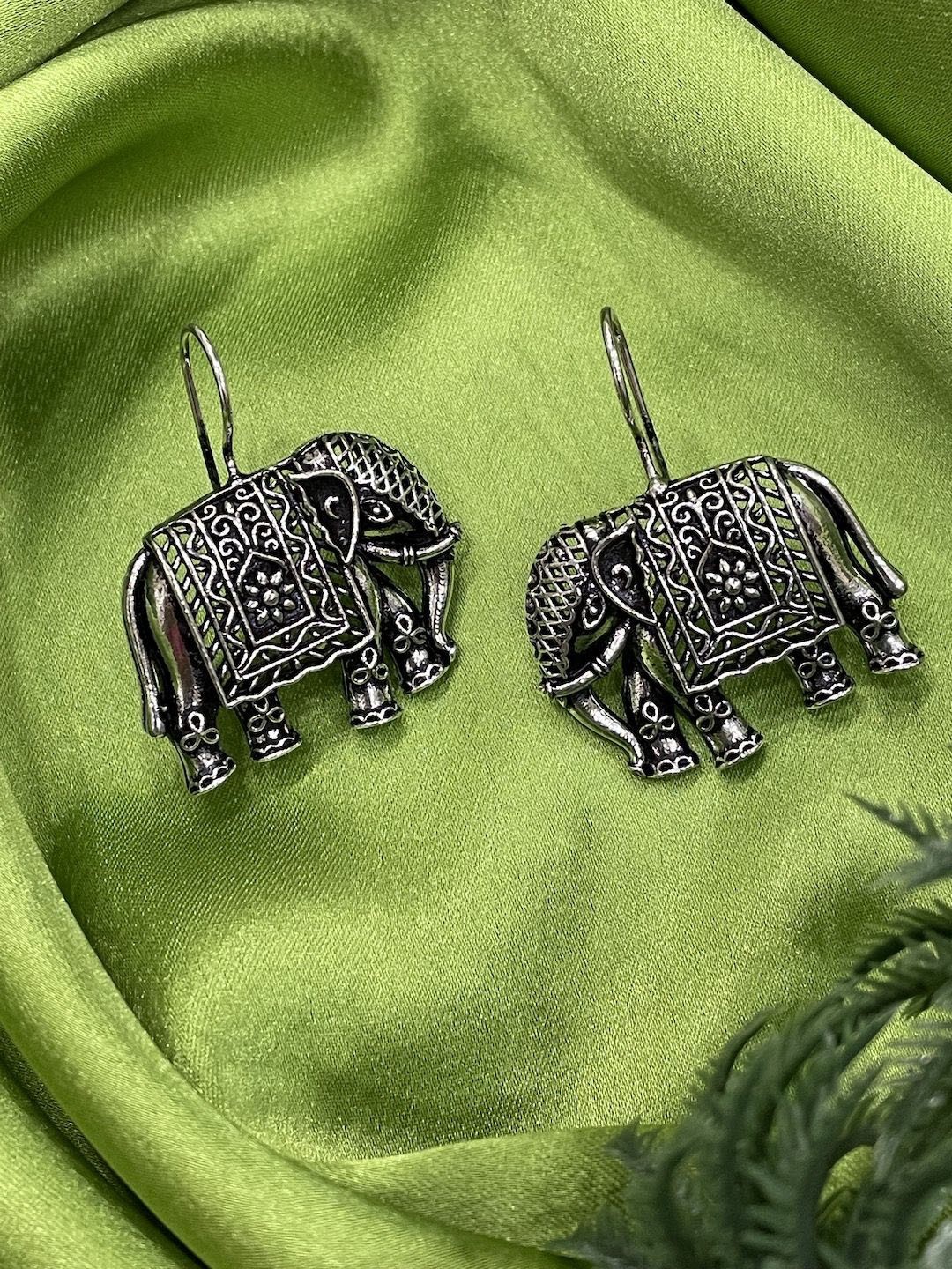 

Digital Dress Room German Silver Animal Shaped Oxidised Drop Earrings
