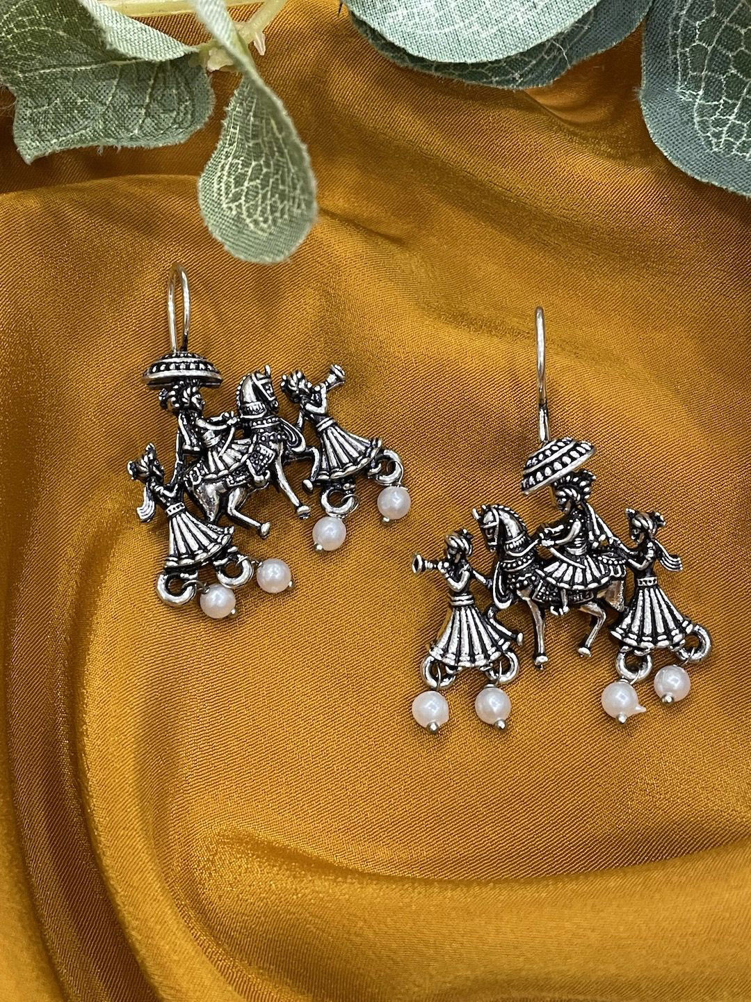 

Digital Dress Room German Silver Groom With Horse Shaped Oxidised Drop Earrings