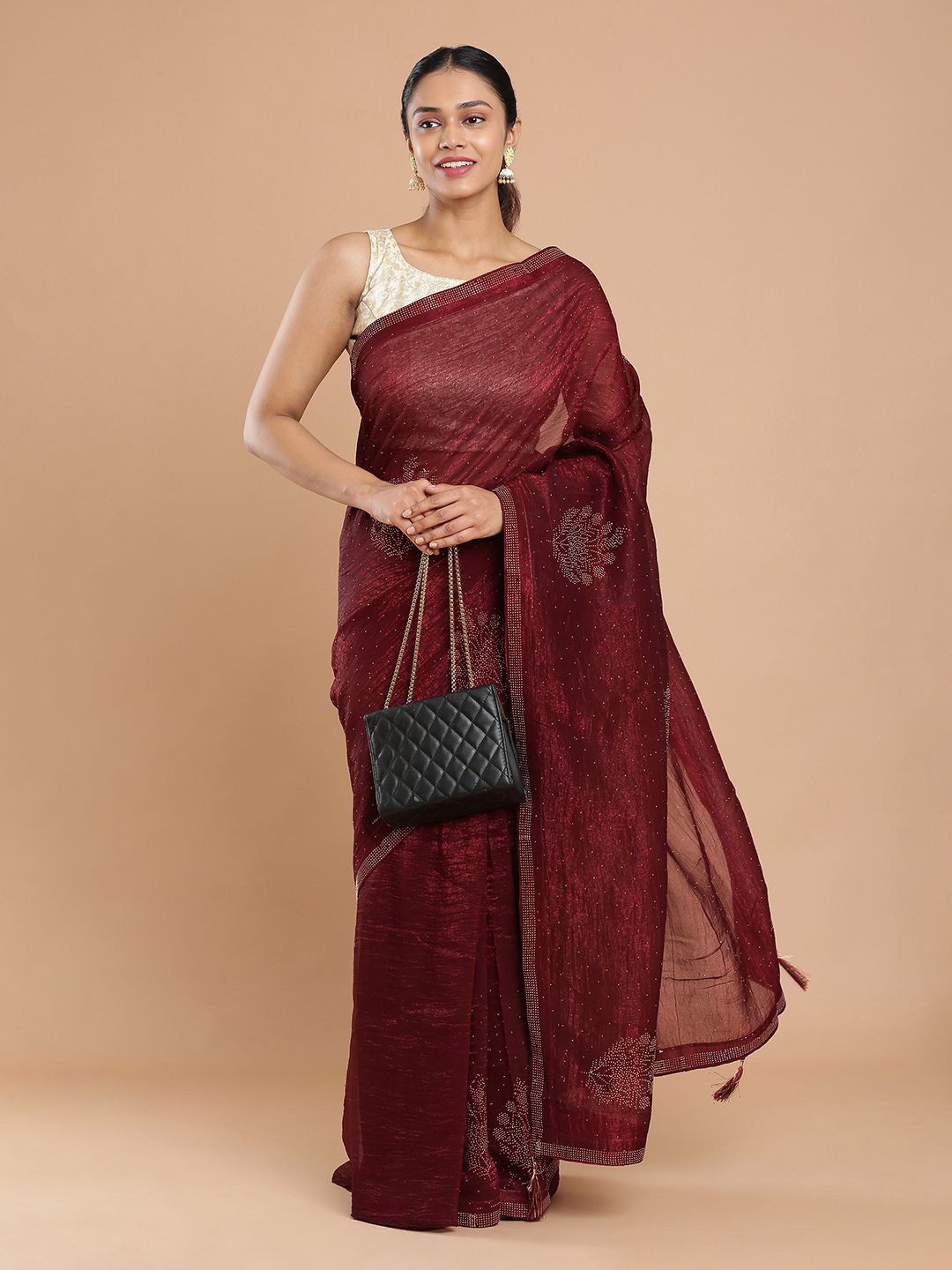

Kalyan Silks Women Embellished Beads and StonesSaree, Maroon