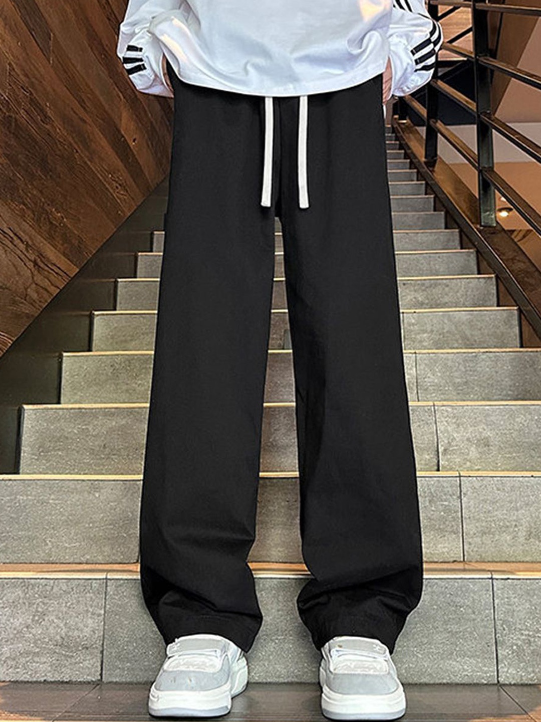 

StyleCast Men Loose Fit Mid-Rise Flat-Front Trousers, Black