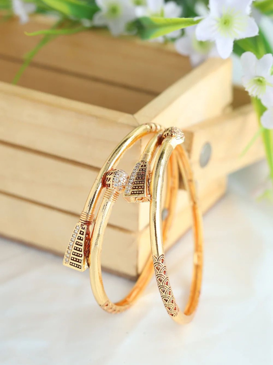 

Zeraki Jewels Jahnavi Set Of 2 Gold-Plated Stone Studded Textured Bangles