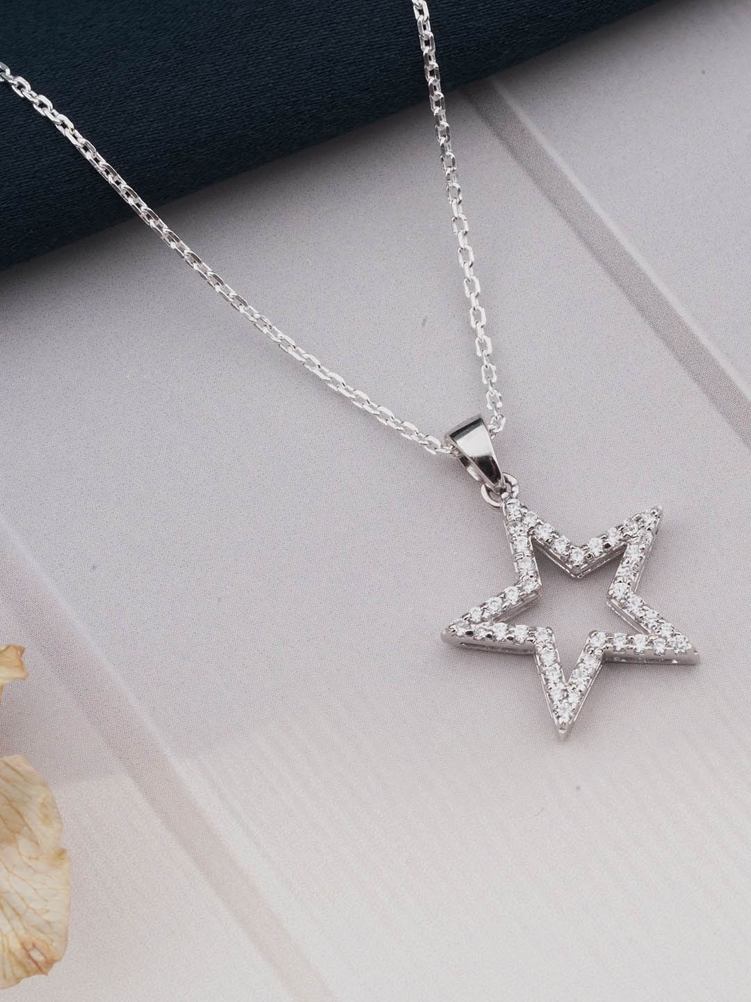 

Zalkari Sterling Silver Rhodium-Plated CZ Studded Star Shaped Pendant with Chain