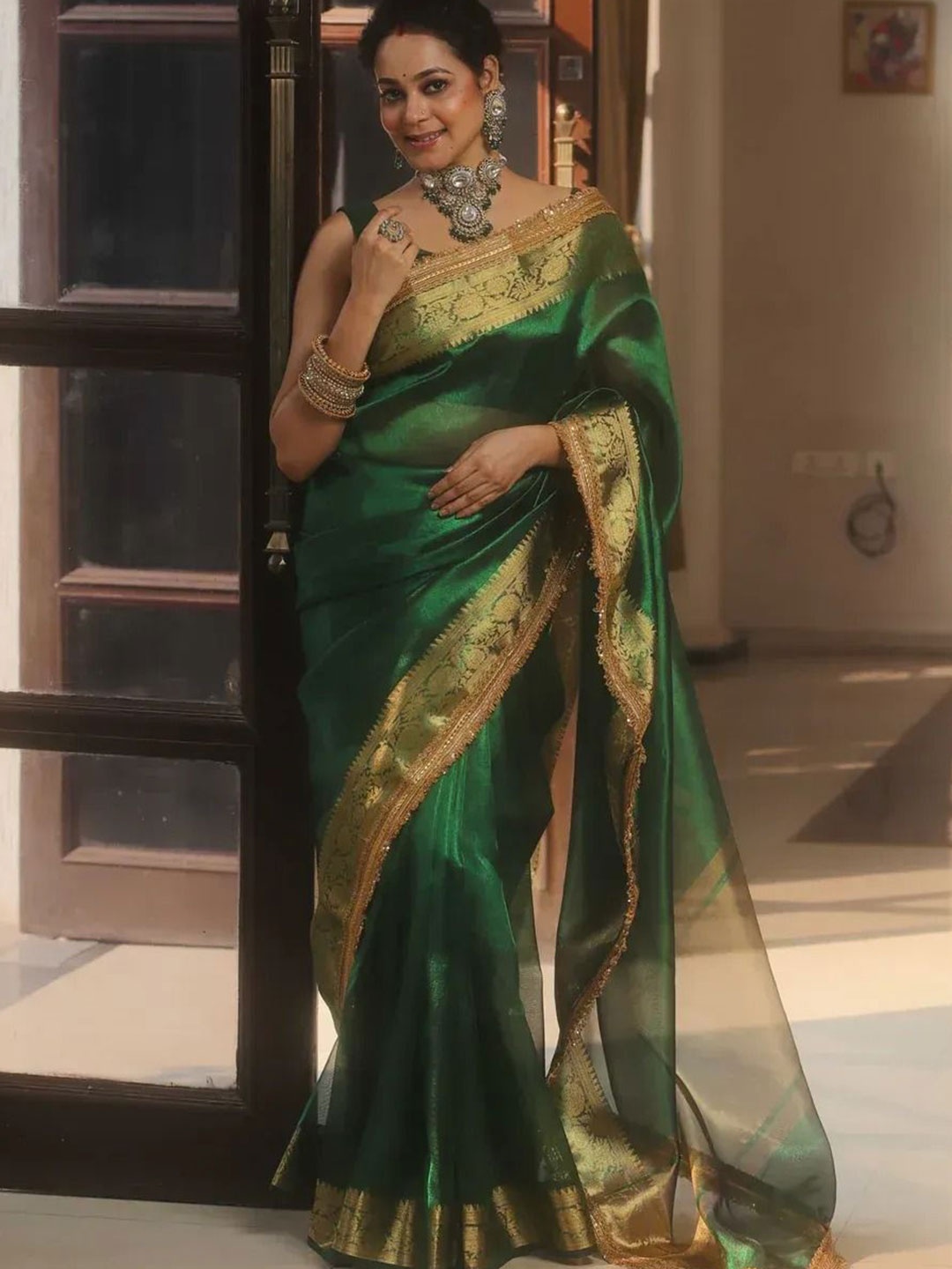 

Kriyansh Woven Design Zari Tissue Maheshwari Saree, Green