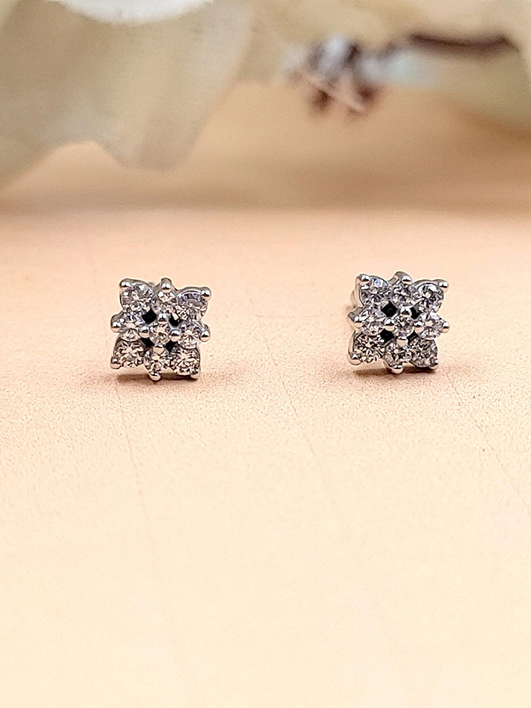 

AMONROO 925 Sterling Silver Rhodium-Plated Cubic Zirconia Stones Studded Floral Studs