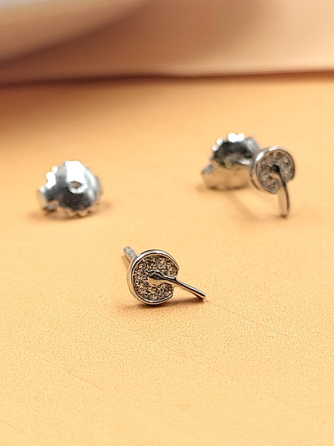 

AMONROO 925 Sterling Silver Rhodium-Plated Cubic Zirconia Stones Studded Circular Studs