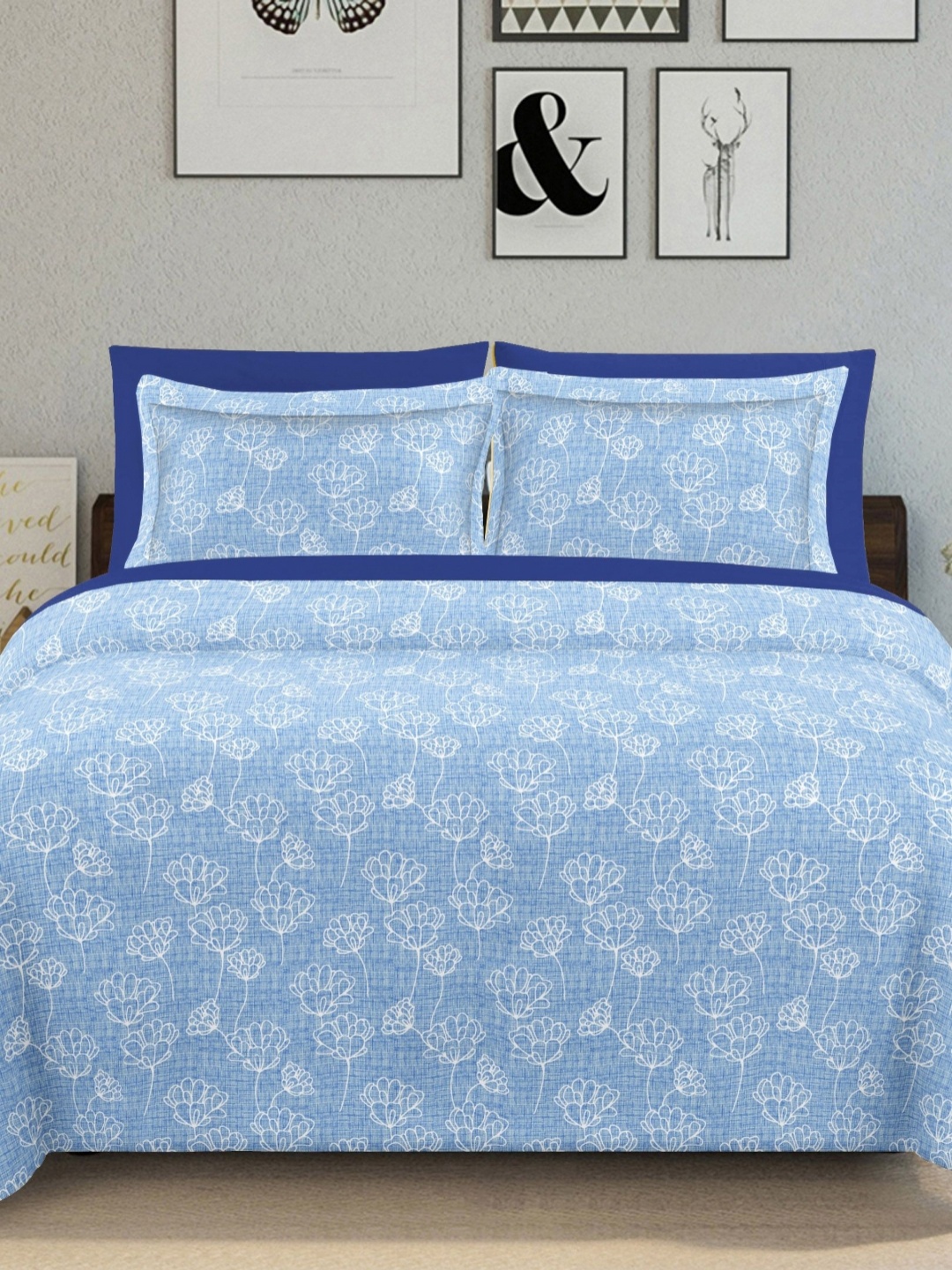 

Ariana Blue & White Floral Printed 144 TC Cotton King Bedsheet Set 2.70 m x 2.25 m