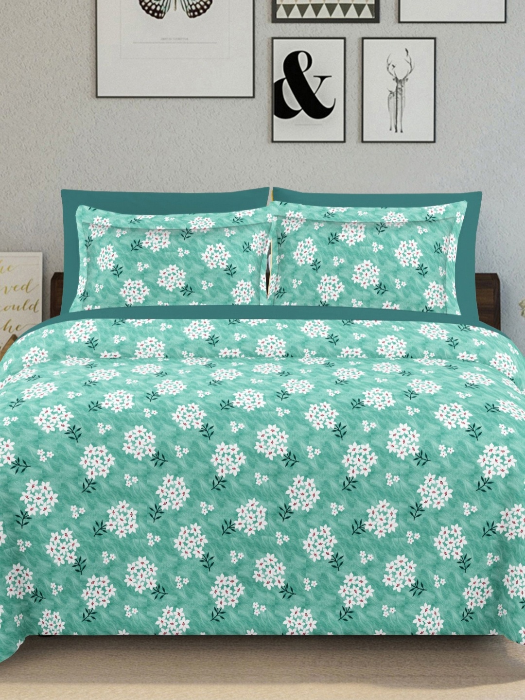 

Ariana Turquoise Blue Floral Printed 144 TC Cotton King Bedsheet Set 2.70 m x 2.25 m