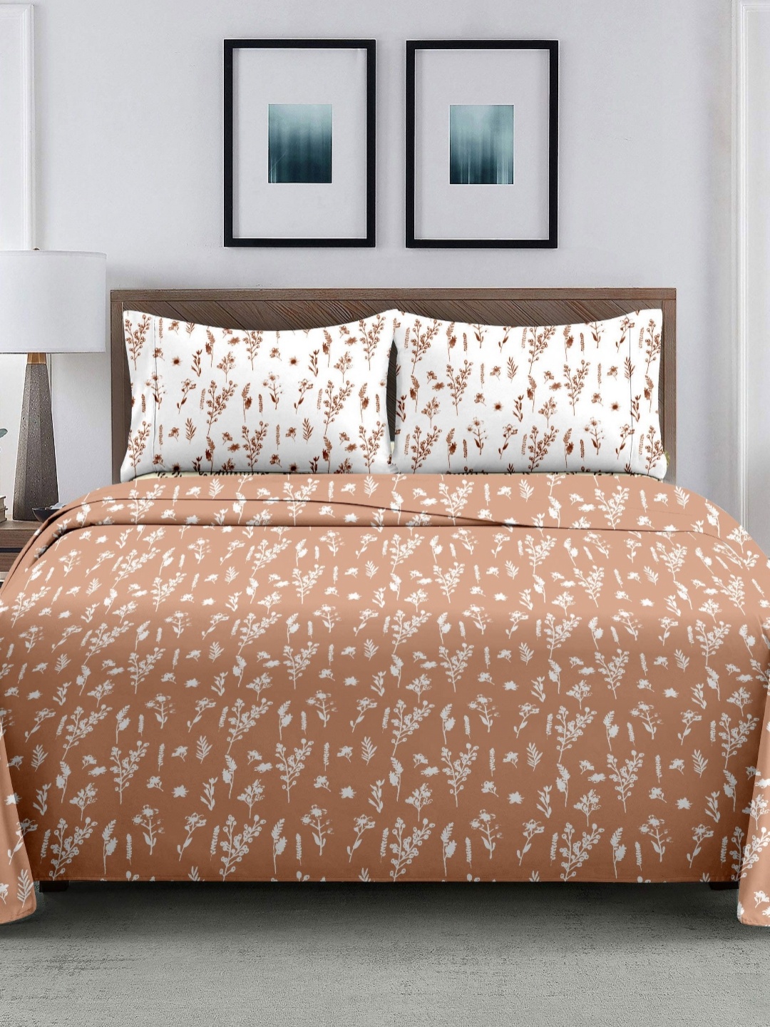 

Ariana White & Brown Floral Printed 210 TC Cotton King Bedsheet Set 2.70 m x 2.70 m