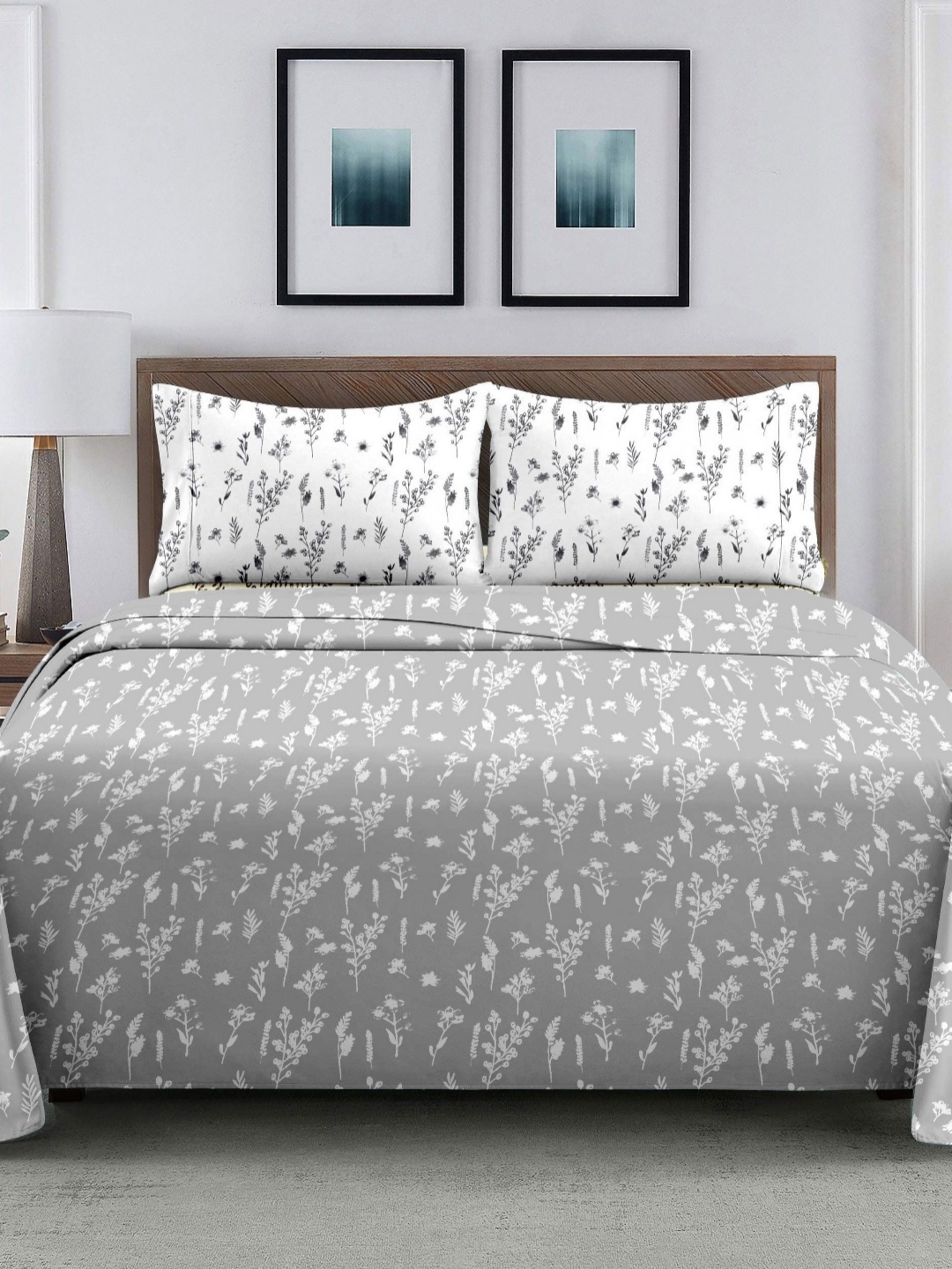 

Ariana White & Grey Floral Printed 210 TC Cotton King Bedsheet Set 2.70 m x 2.70 m