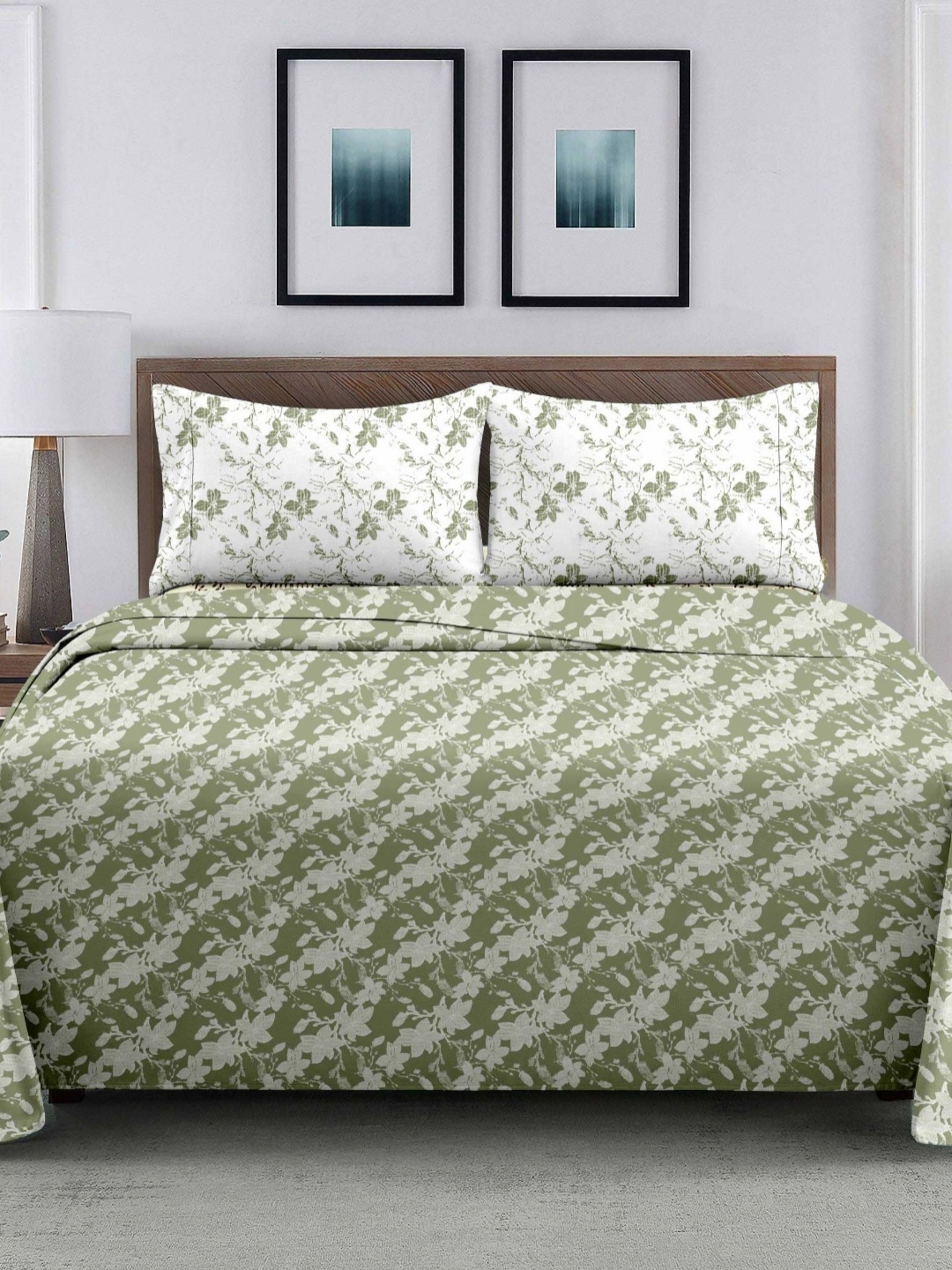 

Ariana White & Green Floral Printed 210 TC Cotton King Bedsheet Set 2.70 m x 2.70 m
