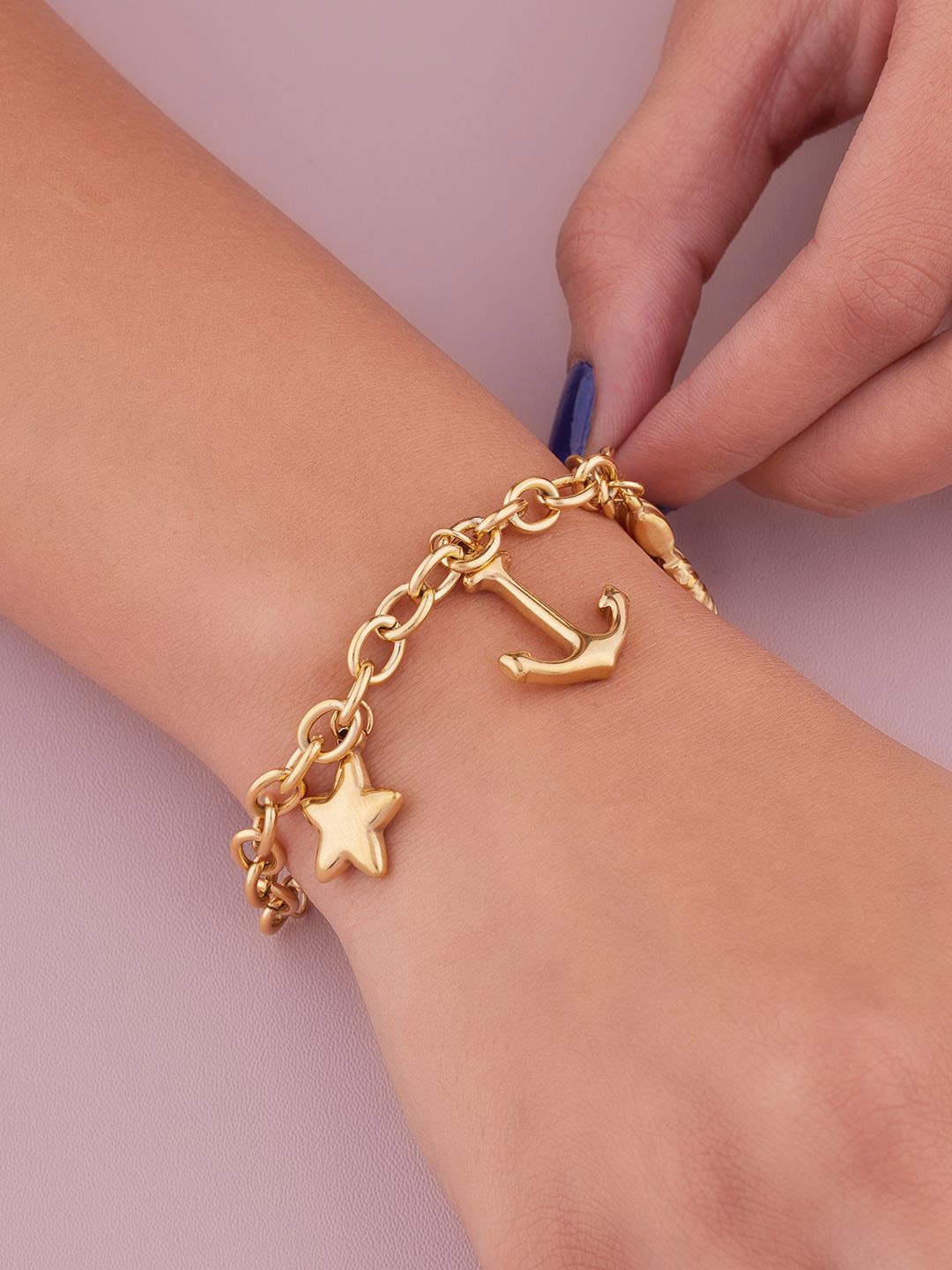 

ANJNI CREATION Gold-Plated Stainless Steel Tarnish-Free Ocean Charm Bracelet