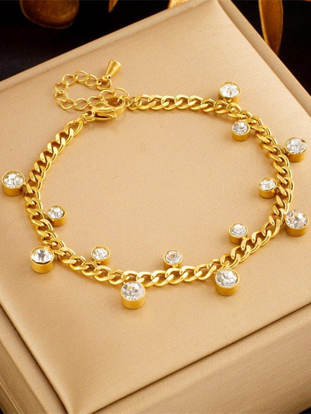 

ANJNI CREATION Gold-Plated AD Studded Stainless Steel Tarnish-Free Minora Link Bracelet
