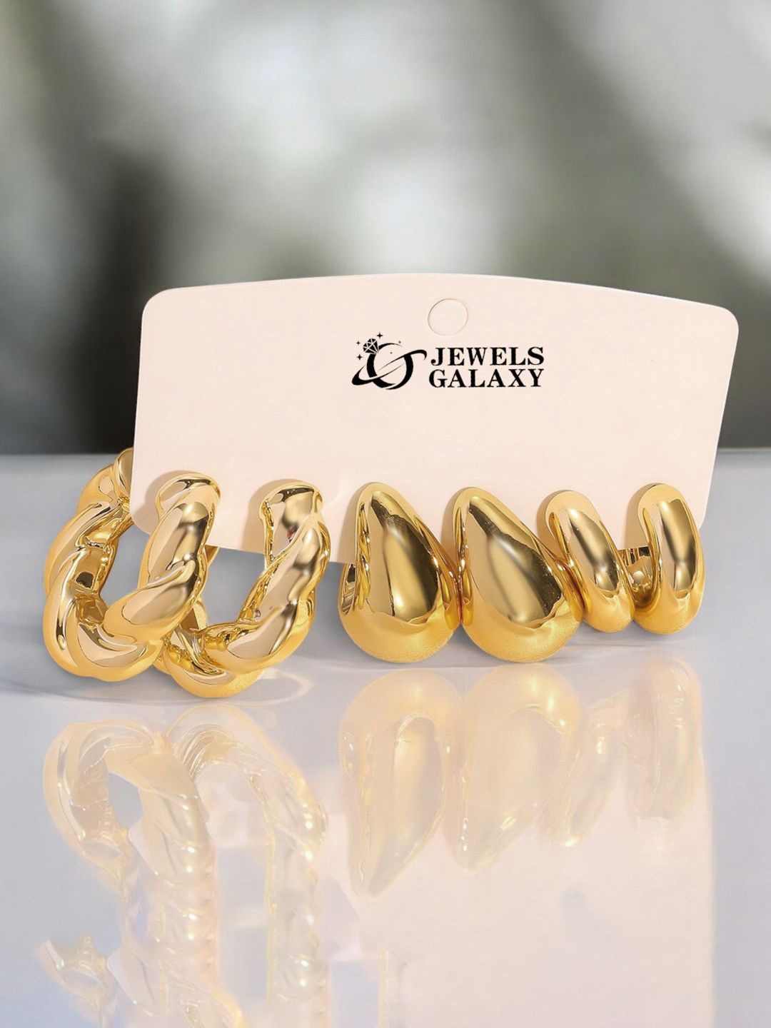 

Jewels Galaxy Set Of 3 Gold- Plated Contemporary Shaped Half Hoop Earrings