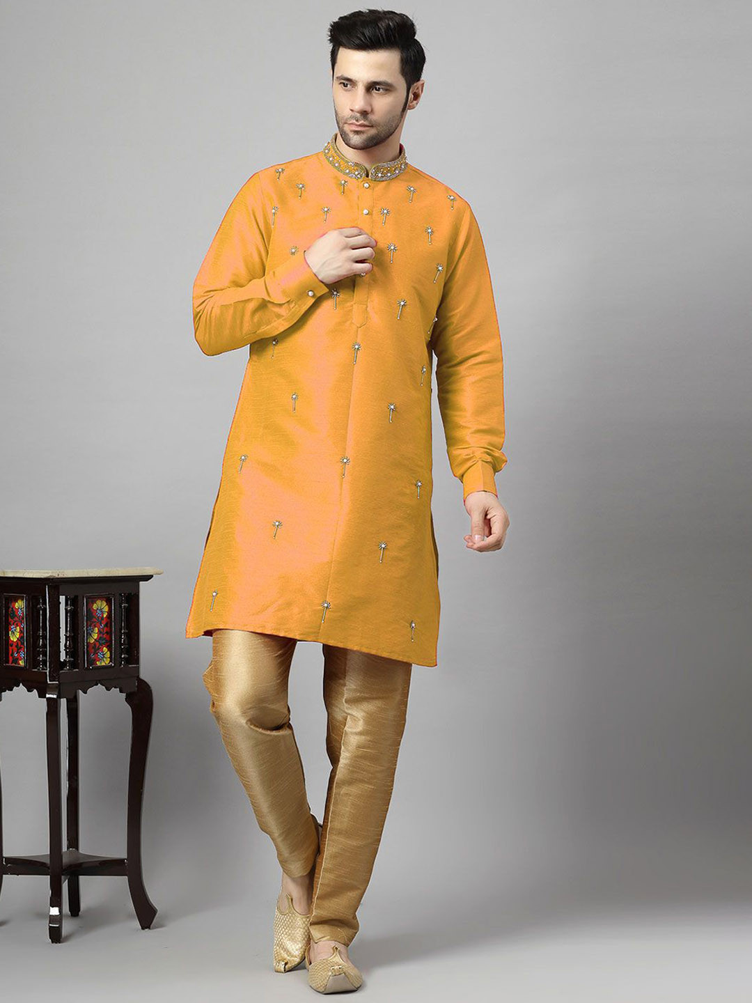 

Utsav Fashion Floral Embroidered Beads and Stones Art Silk Straight Kurta with Trousers, Mustard