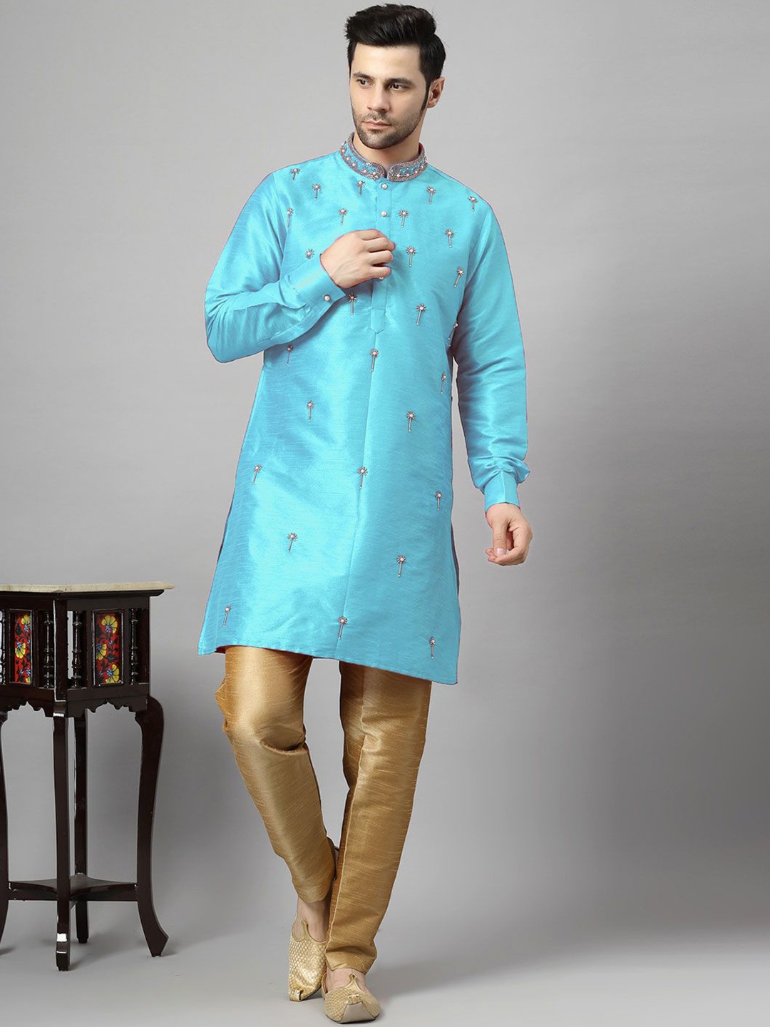 

Utsav Fashion Ethnic Motifs Embroidered Beads and Stones Kurta with Trouser, Blue