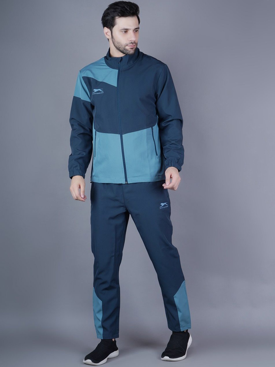 

Shiv Naresh Men Colourblocked Tracksuits, Blue