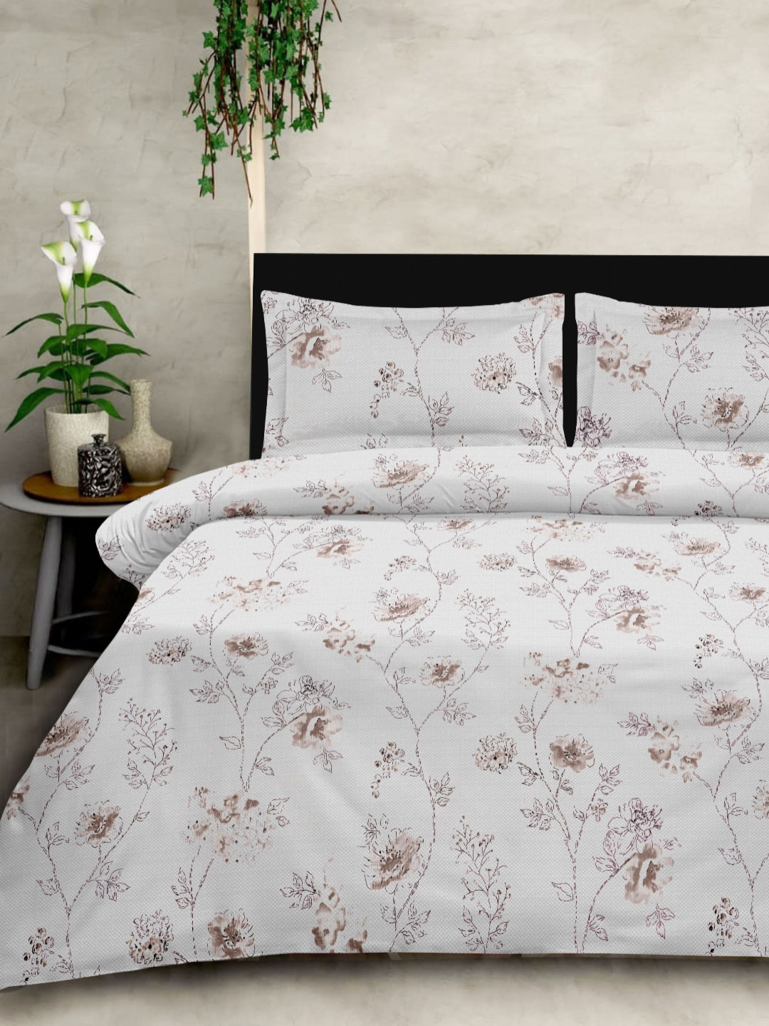 

Ariana Grey & White Floral Printed 210 TC Cotton King Bedsheet Set 2.70 m x 2.70 m