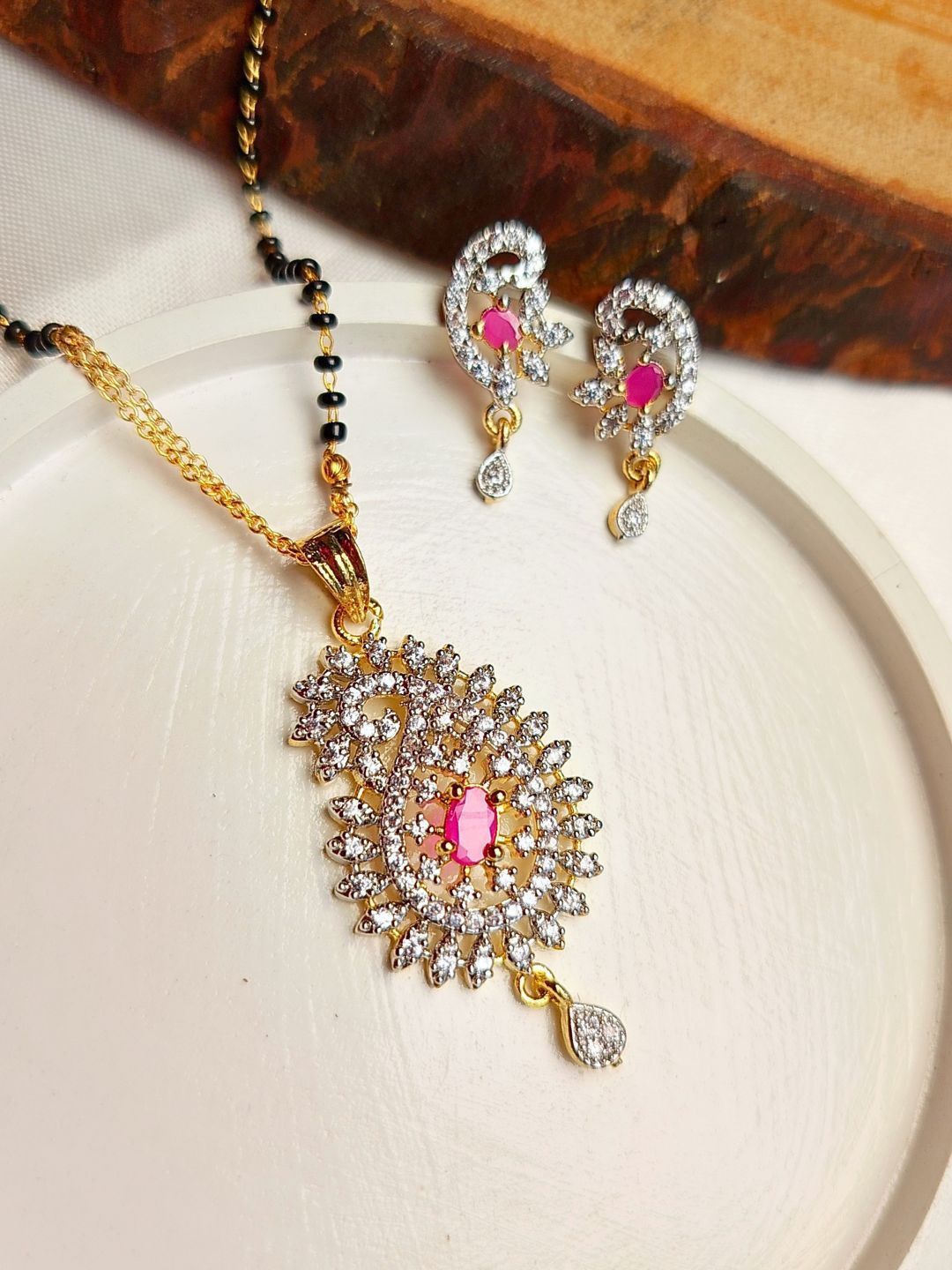 

Anouk Gold-Plated American Diamond Stone-Studded Stainless Steel Managlsutra
