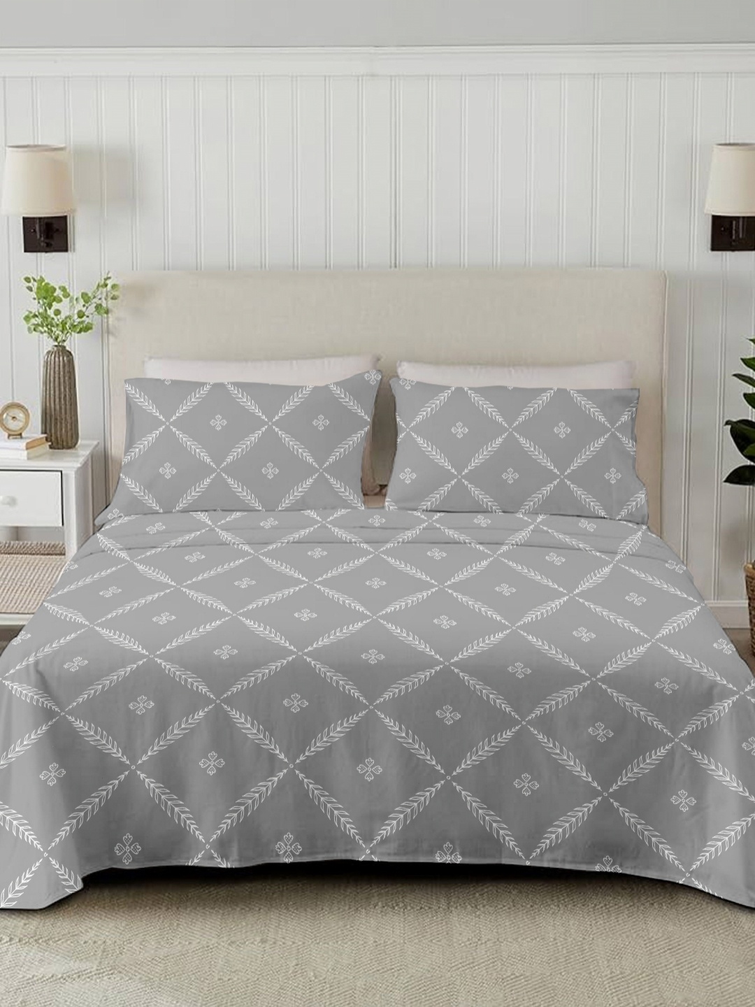

Ariana Grey & White Floral Printed Cotton 210 TC King Bedsheet Set 2.70 m x 2.70 m