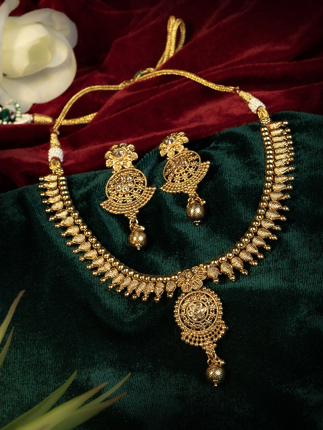 

GOLD CASH Gold Plated Stone Studded & Beaded Anti-Tarnish Necklace and Earrings