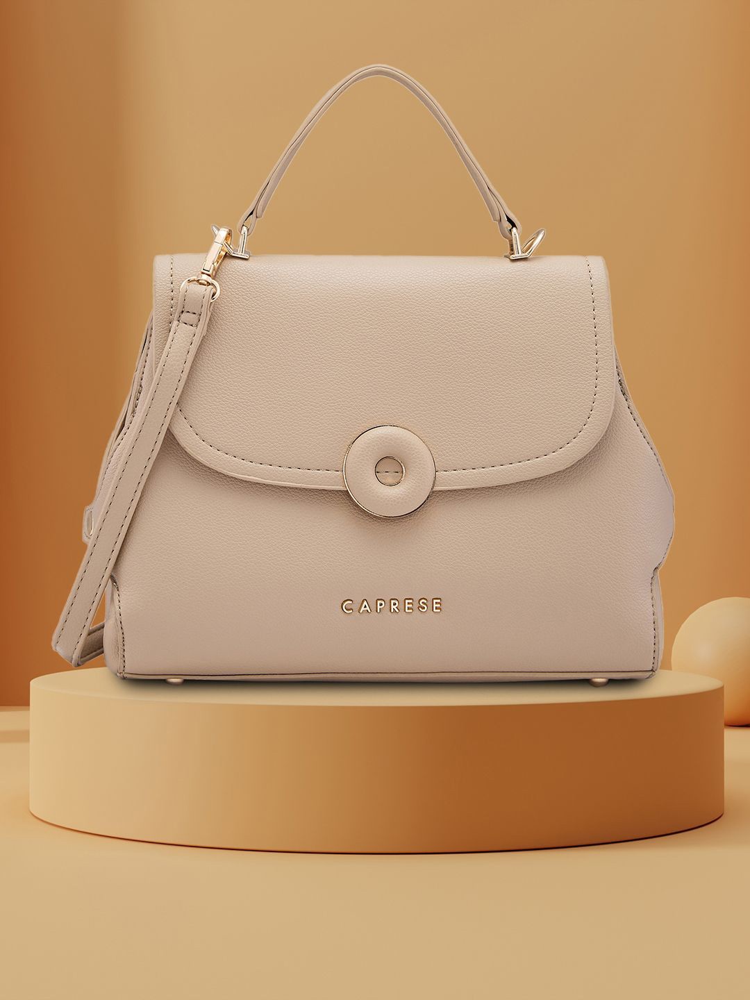 

Caprese Women Solid Structured Satchel Bag, Beige