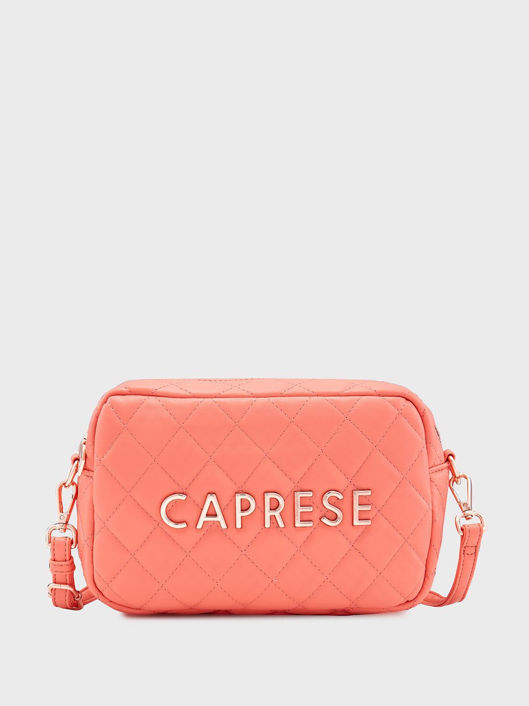 

Caprese Women Solid Structured Sling Bag, Peach