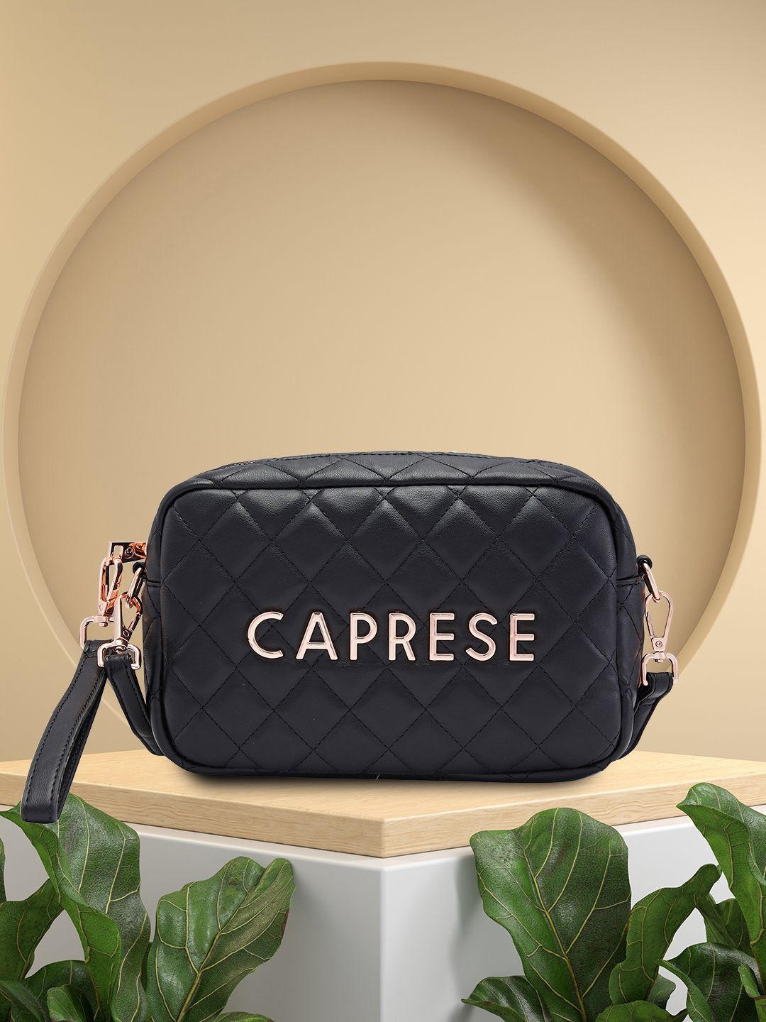 

Caprese Women Solid Structured Sling Bag, Black