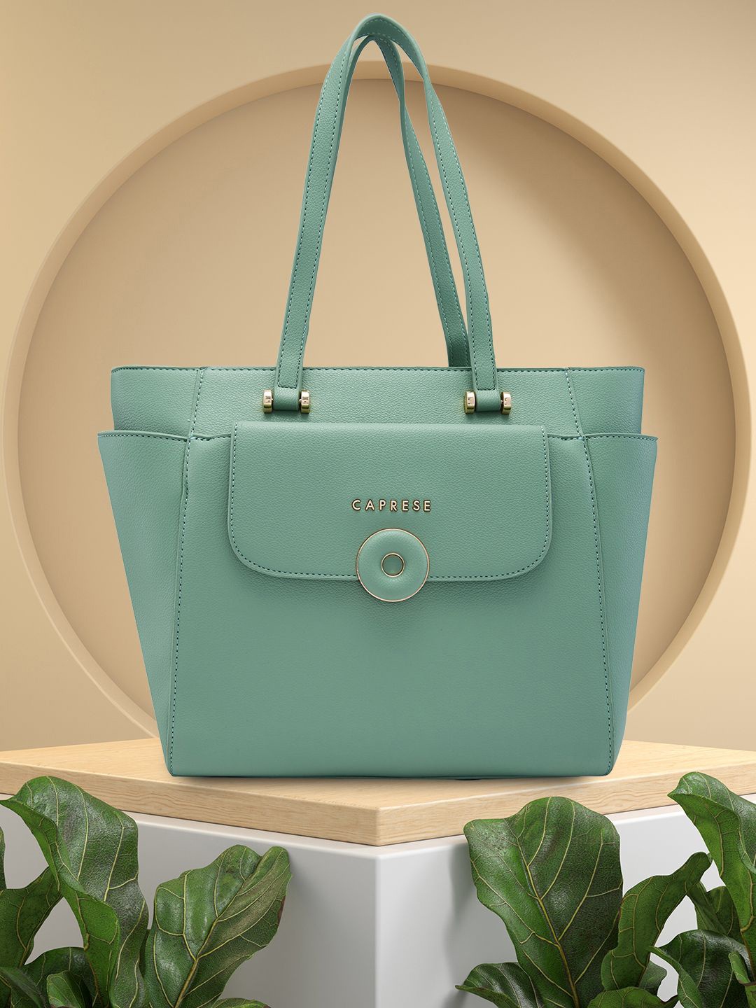 

Caprese Women Solid Structured Shoulder Bag, Green