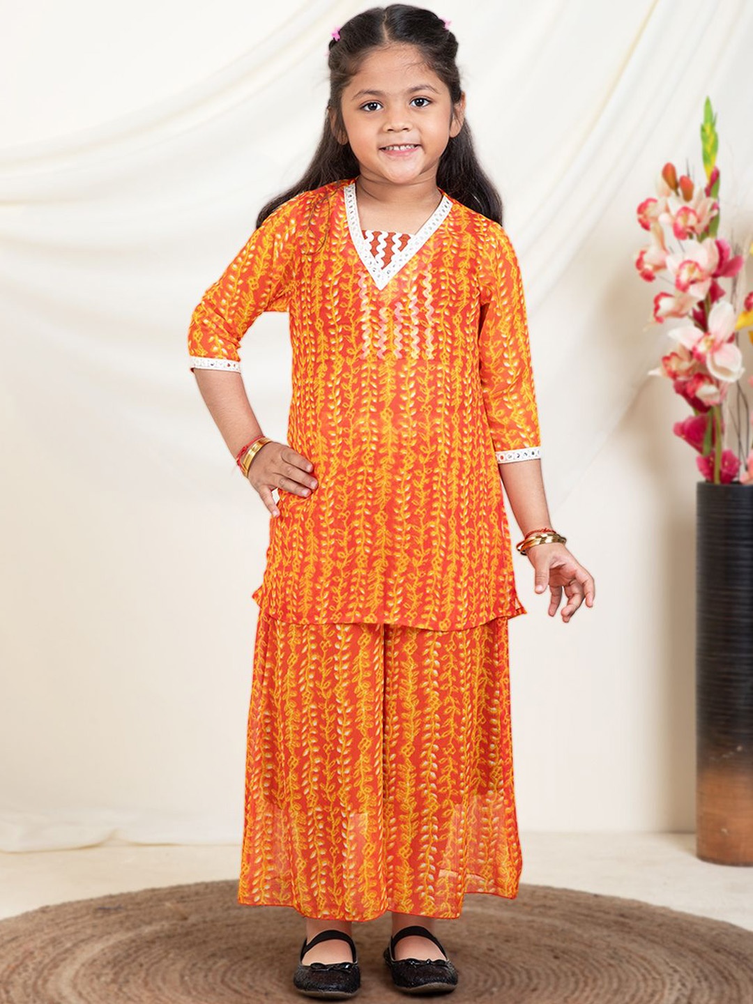 

Bugandbees Girls Floral Printed V-Neck Straight Kurti And Palazzo With Inner Top, Orange